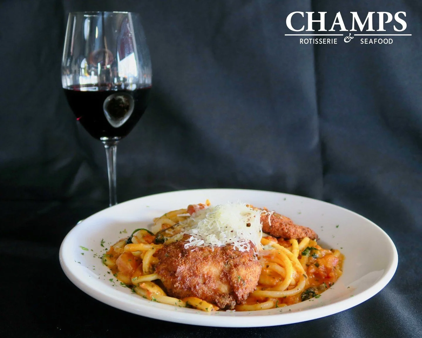 Share a bottle with dinner tonight! It's half off wine night at Champs!