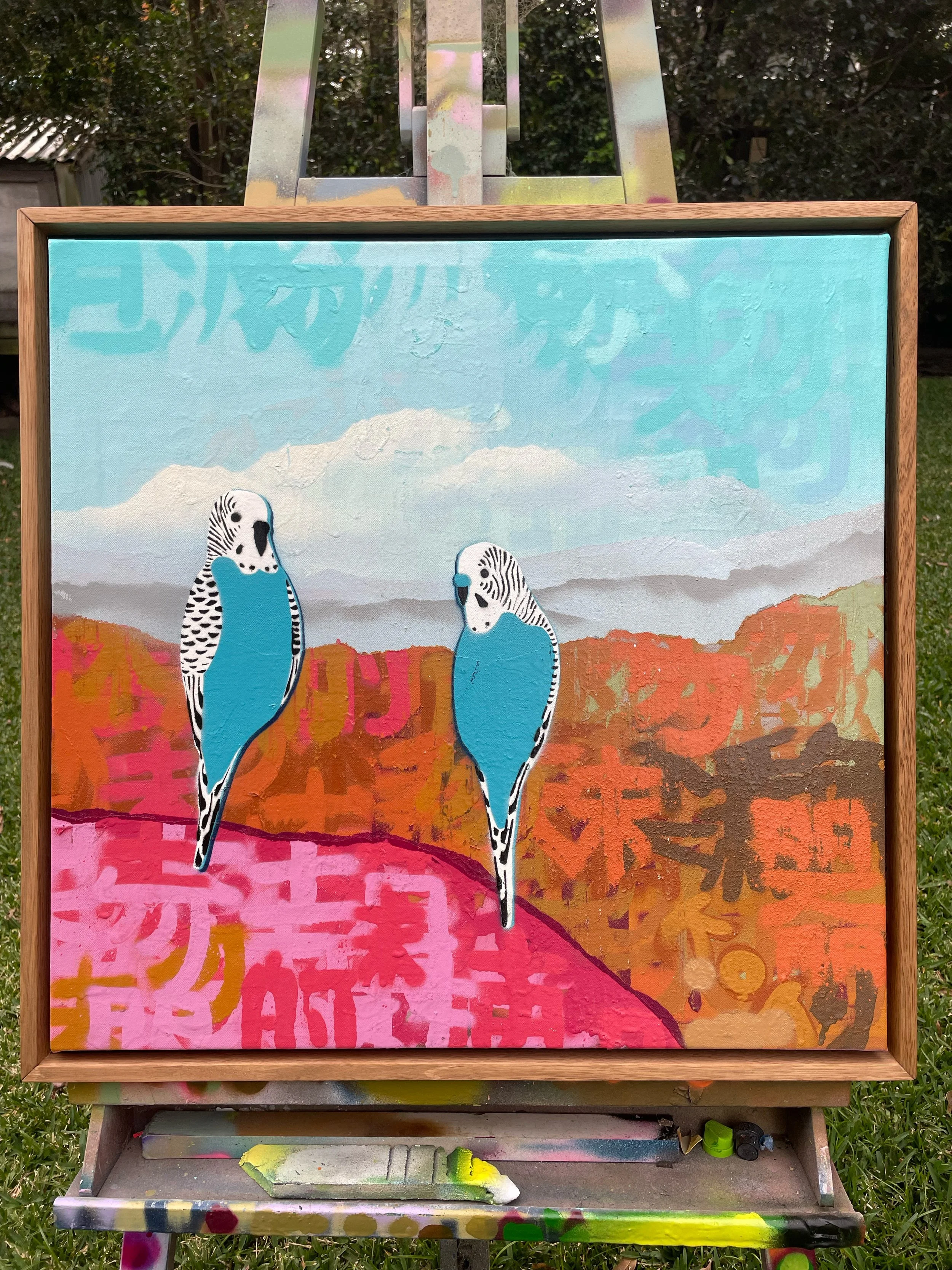 Two Blue And White Budgies In The Bush.jpg