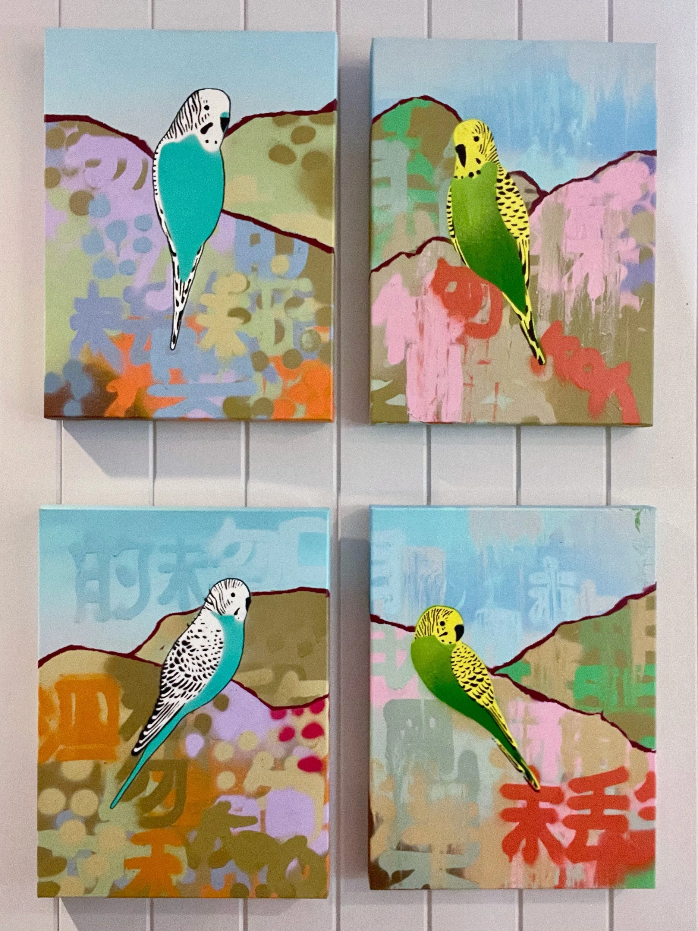 Various small budgie stencil paintings
