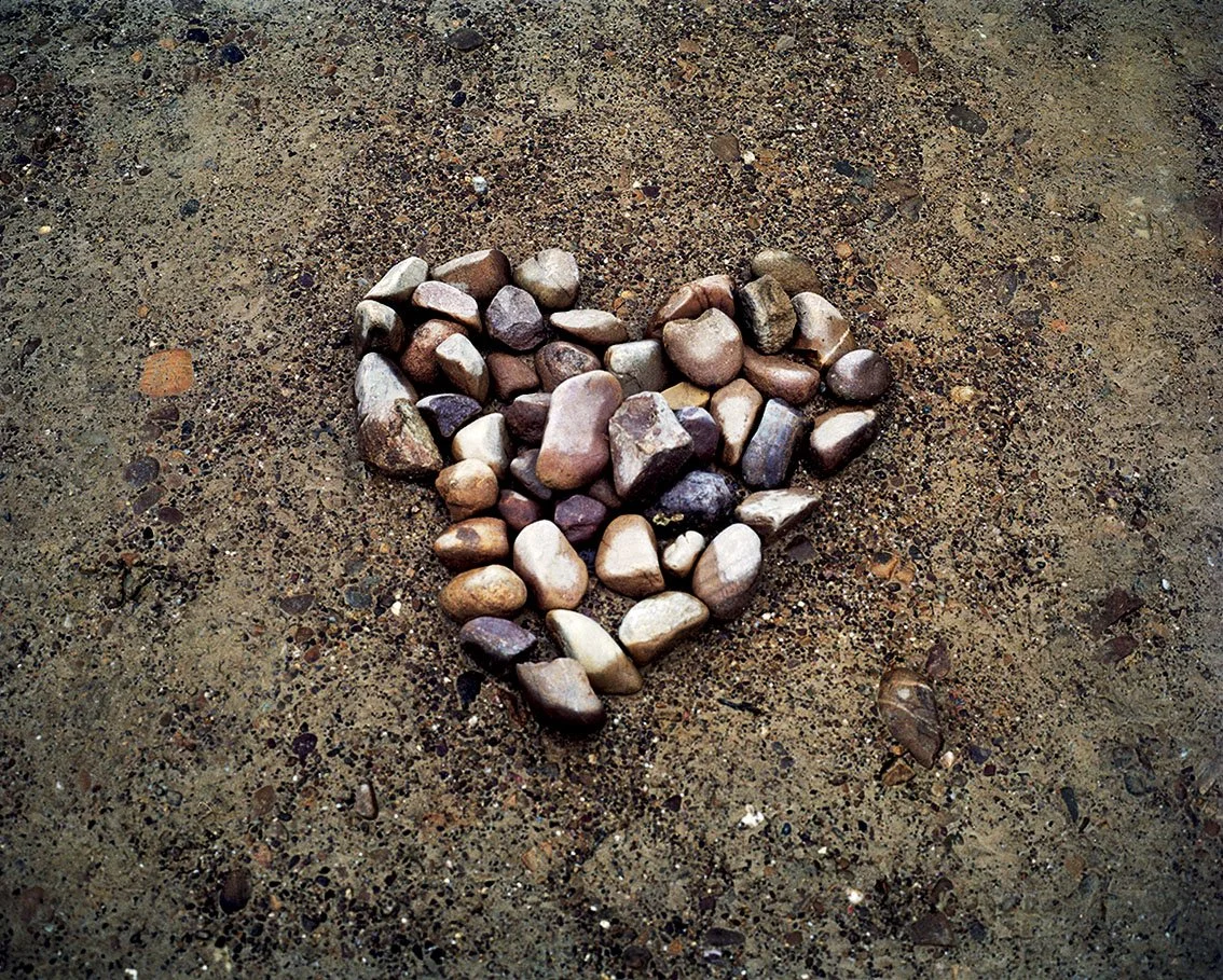 Core of different-colored stones on a concrete floor