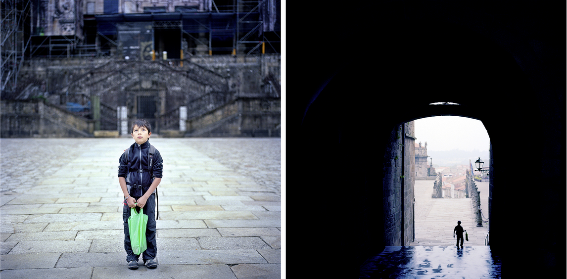 A boy standing in a cobbled courtyard in front of an old building on the left, and a figure walking through a dark tunnel towards a light at the far right.