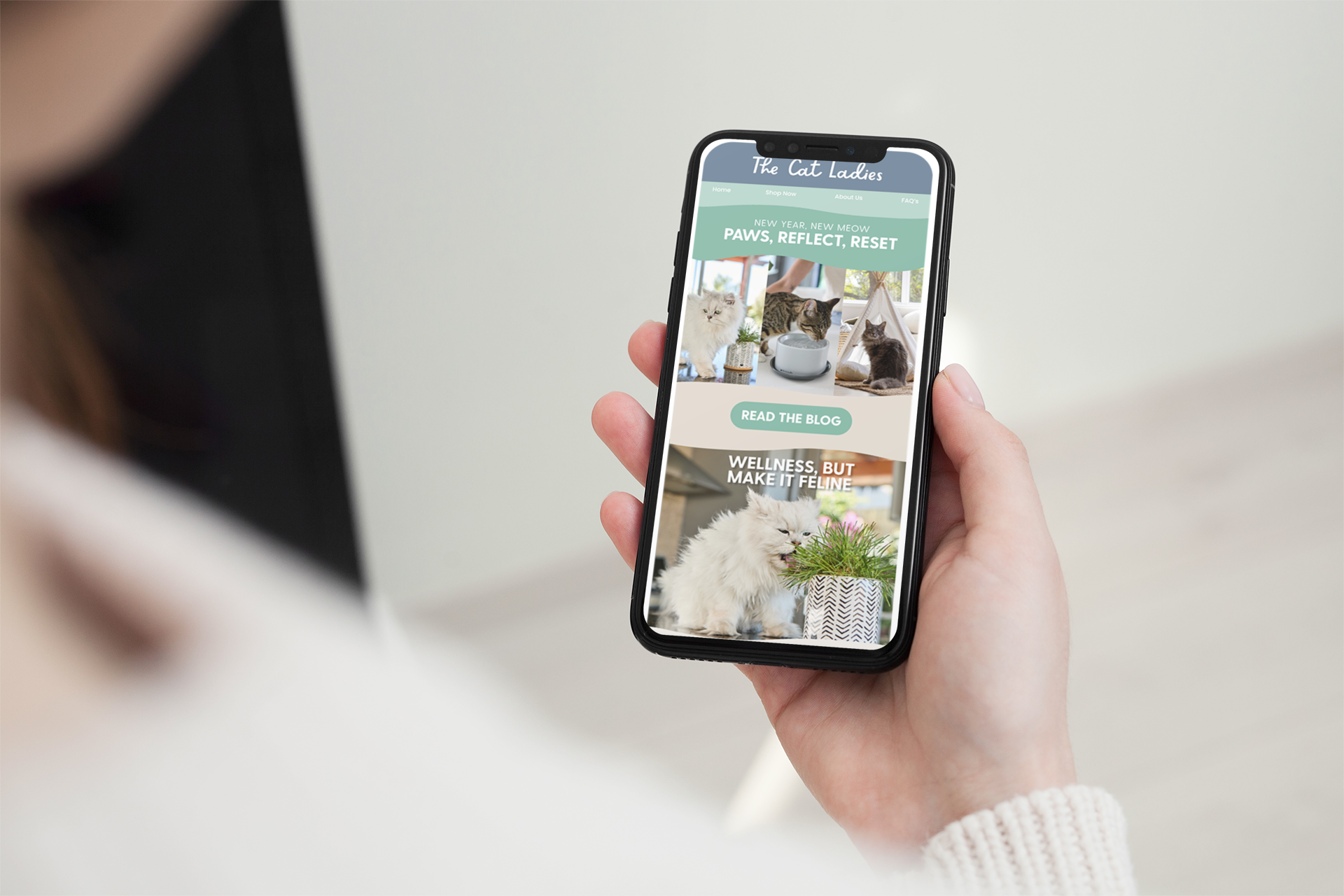 mockup-of-a-woman-holding-an-iphone-11-pro-in-portrait-position-2161-el1 (7).png