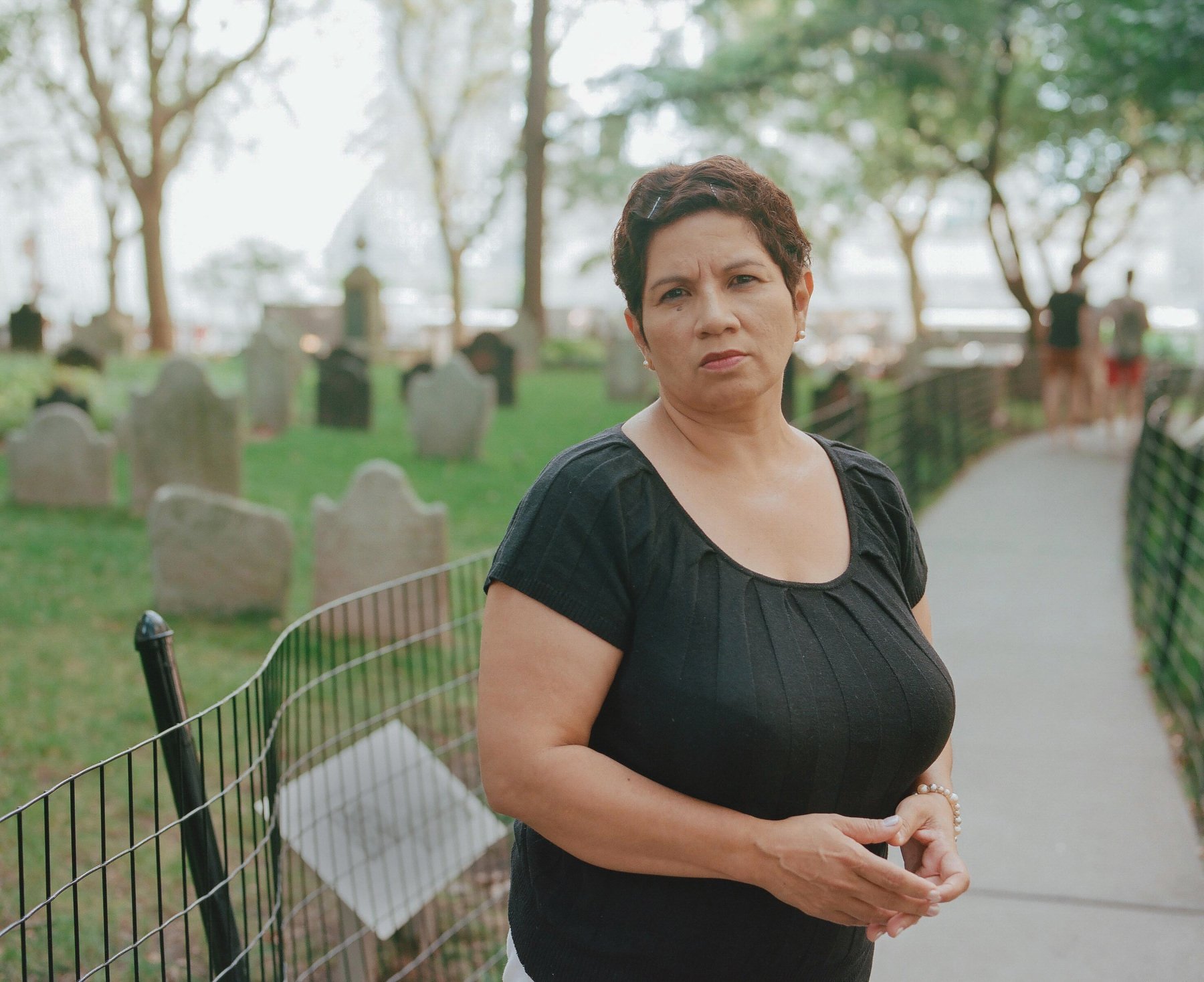 Julia, 51, Works in imports and exports, New York, New York (Photographed at a cemetery adjacent to ground zero in Manhattan)