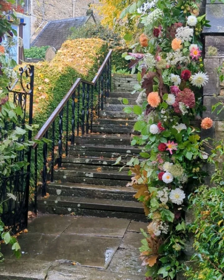 A big thank you to this week's lovely bride and groom for asking me to decorate the entrance arch to @Southcave church. I used moss and a chicken wire frame with beech, and Acer branches. The flowers were added this morning, dahlias from the allotmen