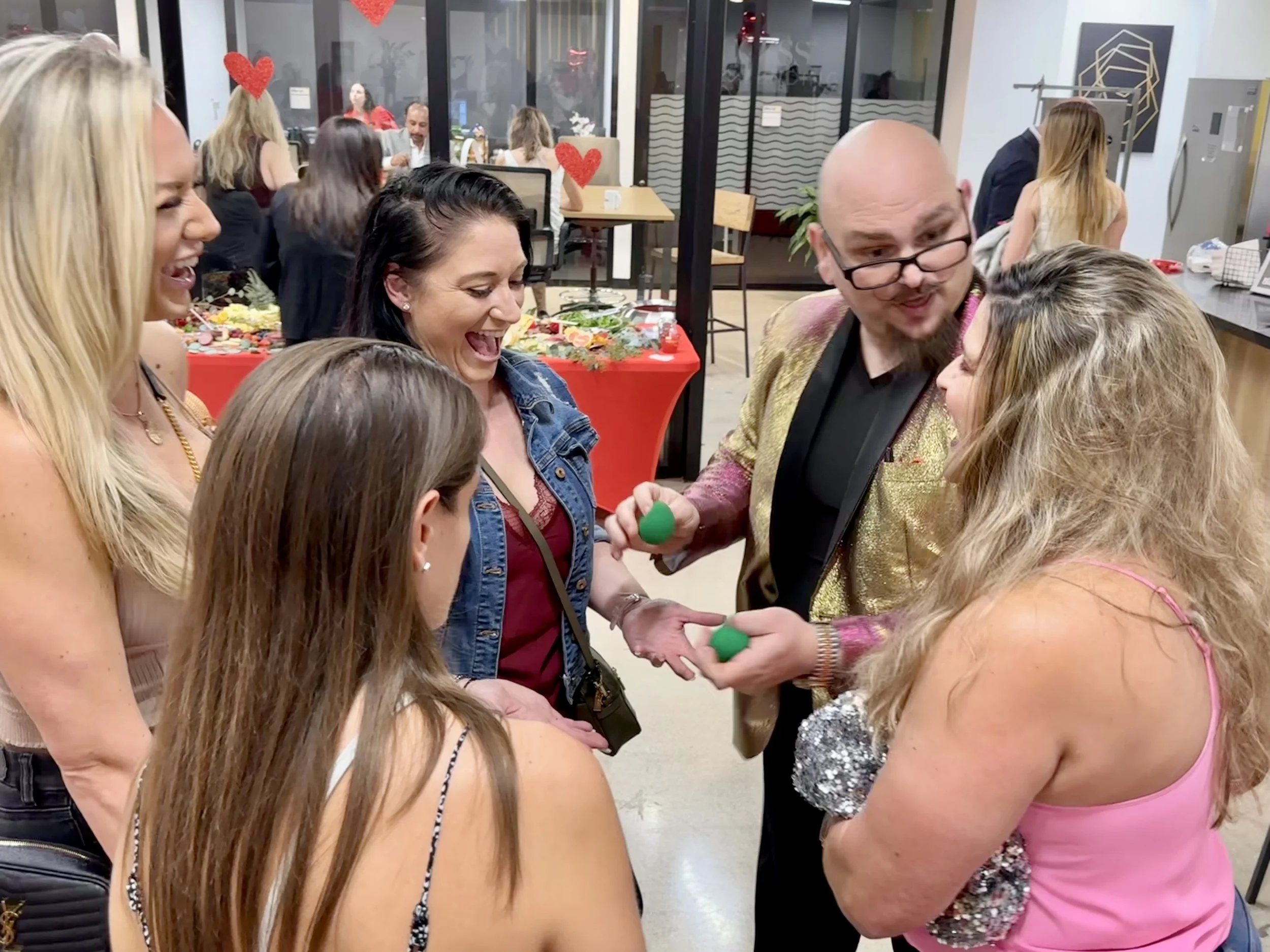 Audience members laughing and reacting during an interactive corporate magic performance by Big Joey Magic Showy.