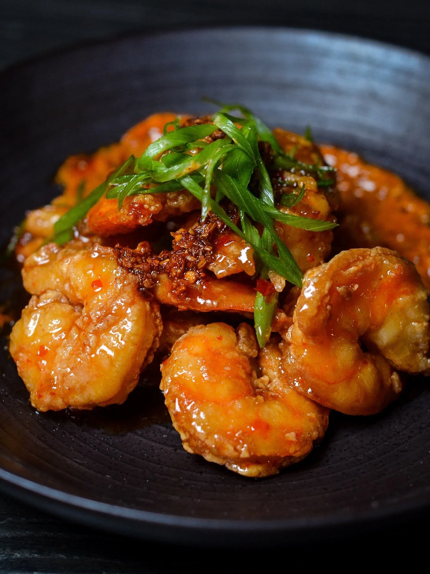 These Spicy Shrimp are a secret worth keeping, if you can find your way here to see why. Served with our signature sweet heat chili sauce and scallions. Snacks are 1/2 off during Friday Happy Hour, 6-7pm.