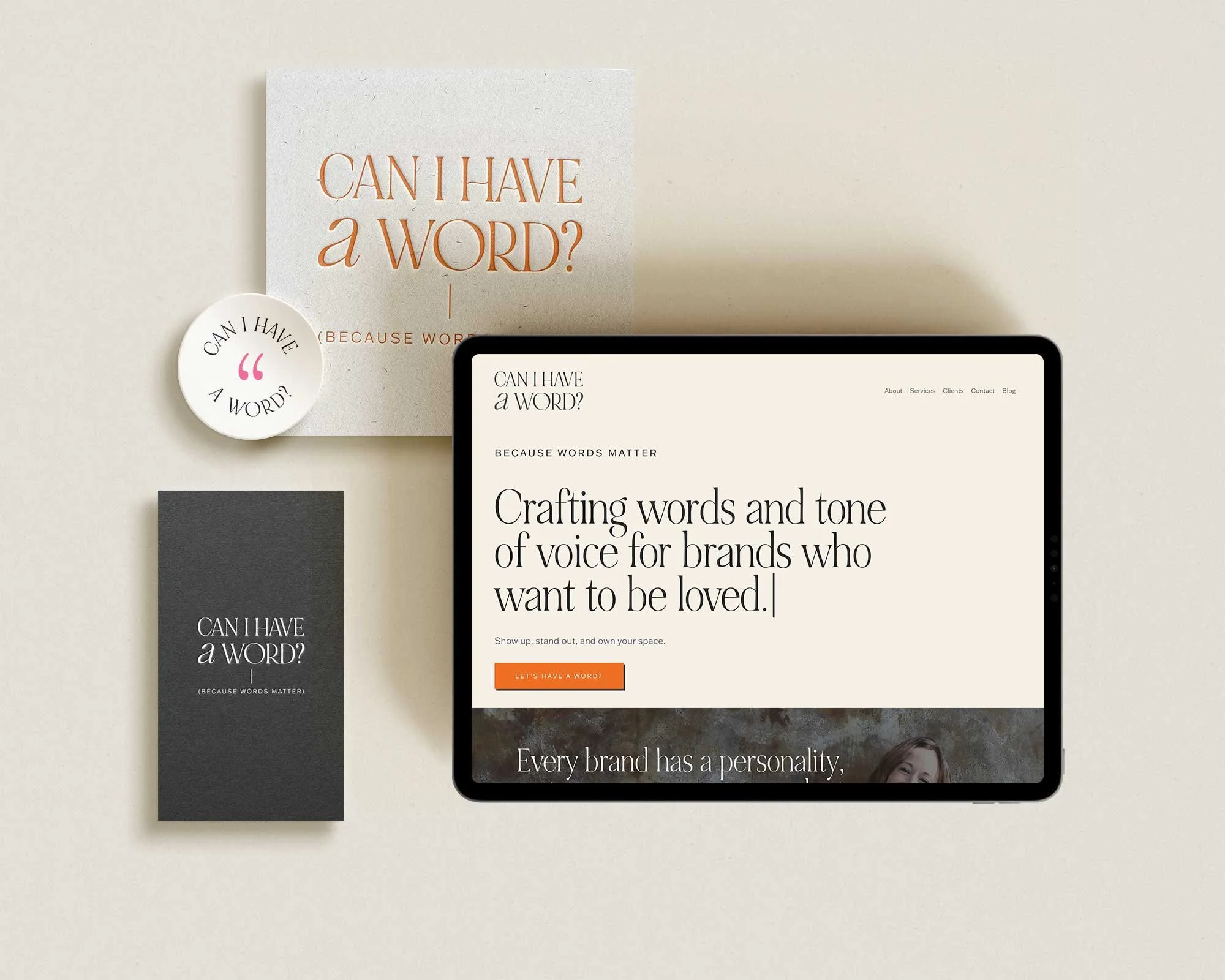A computer screen displaying a website with the question "Can I have a word?" and the subtitle "because words matter." The background includes printed materials and a round sticker with the same question. The scene has a minimalistic and professional design, emphasizing branding and communication.
