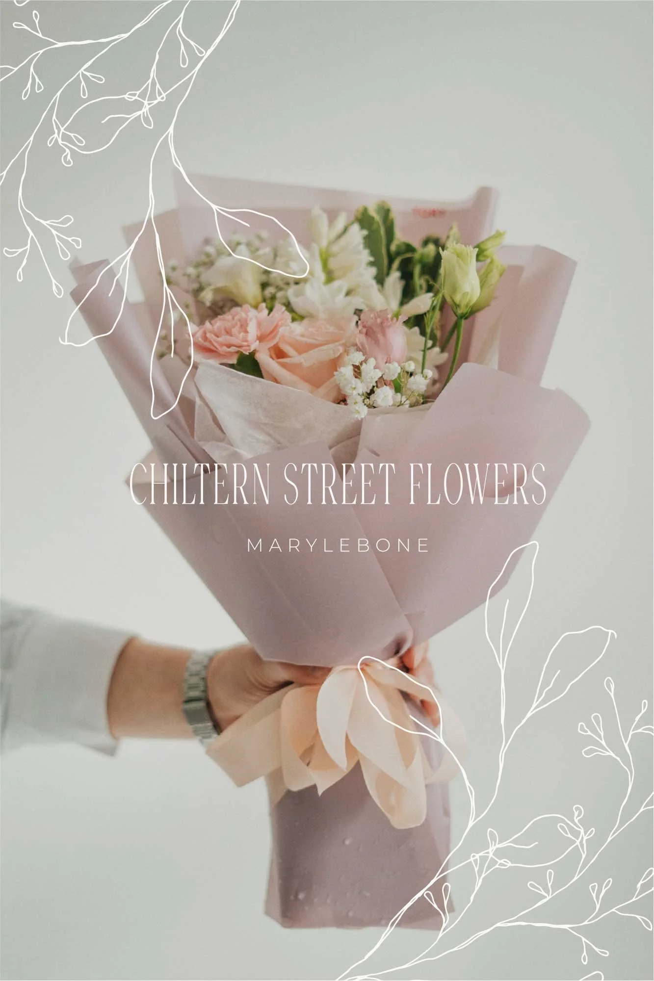 A person holding a bouquet of pink and white flowers wrapped in pink paper with a beige ribbon, against a plain light background with white floral line drawings overlay.
