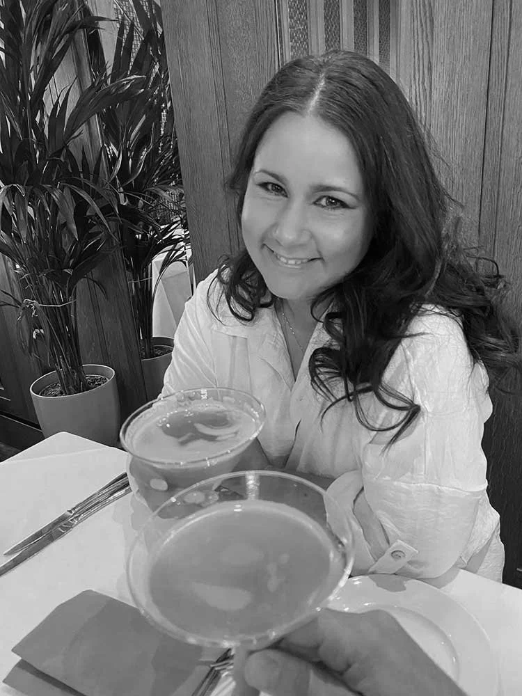 Brand designer drinking a cocktail at Baserri Restaurant in Leamington Spa