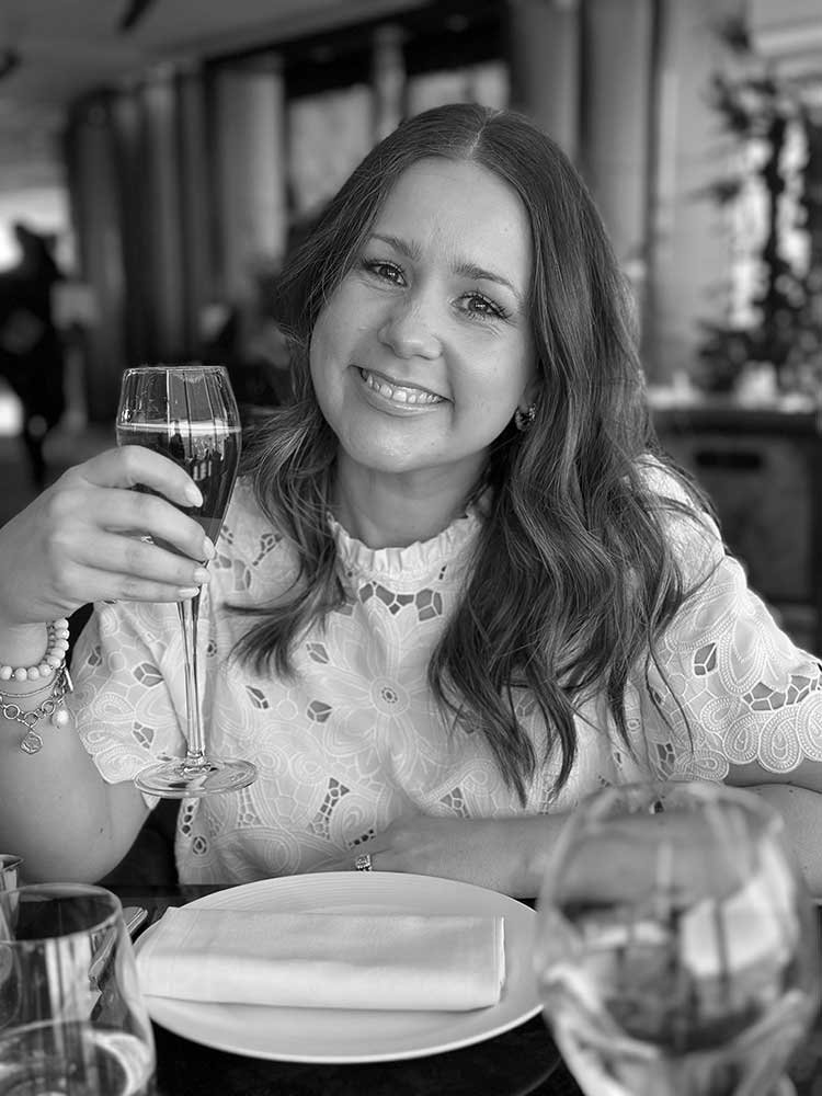 Brand designer drinking Champagne at The Shard in London