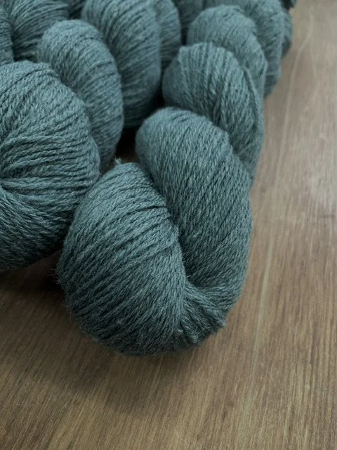 fingering weight sock yarn medium dusty teal closeup