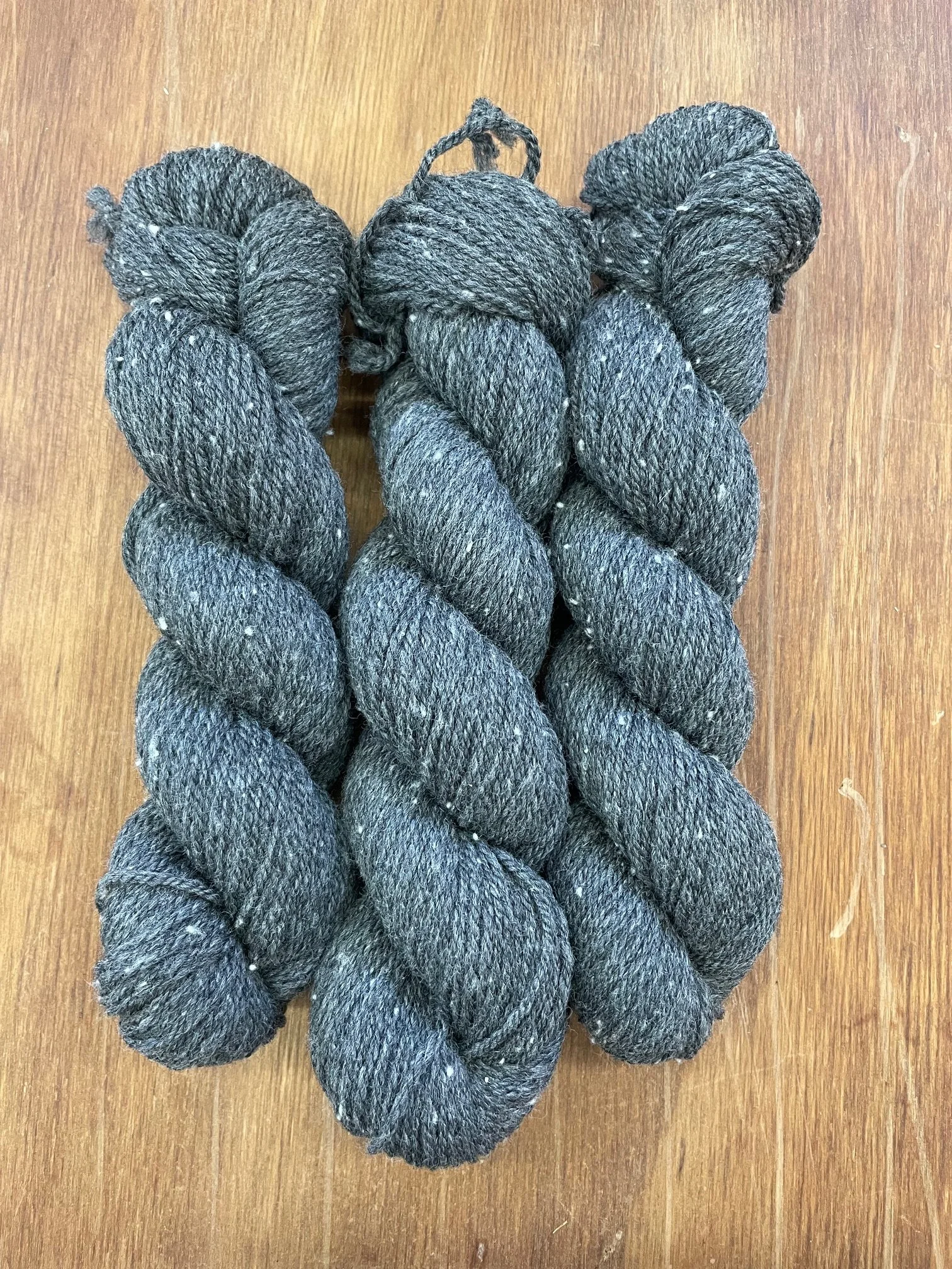 Aranverydarkgreytweedish.jpeg
