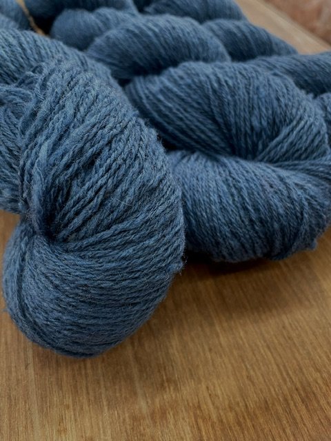 fingering weight sock yarn medium navy blue closeup