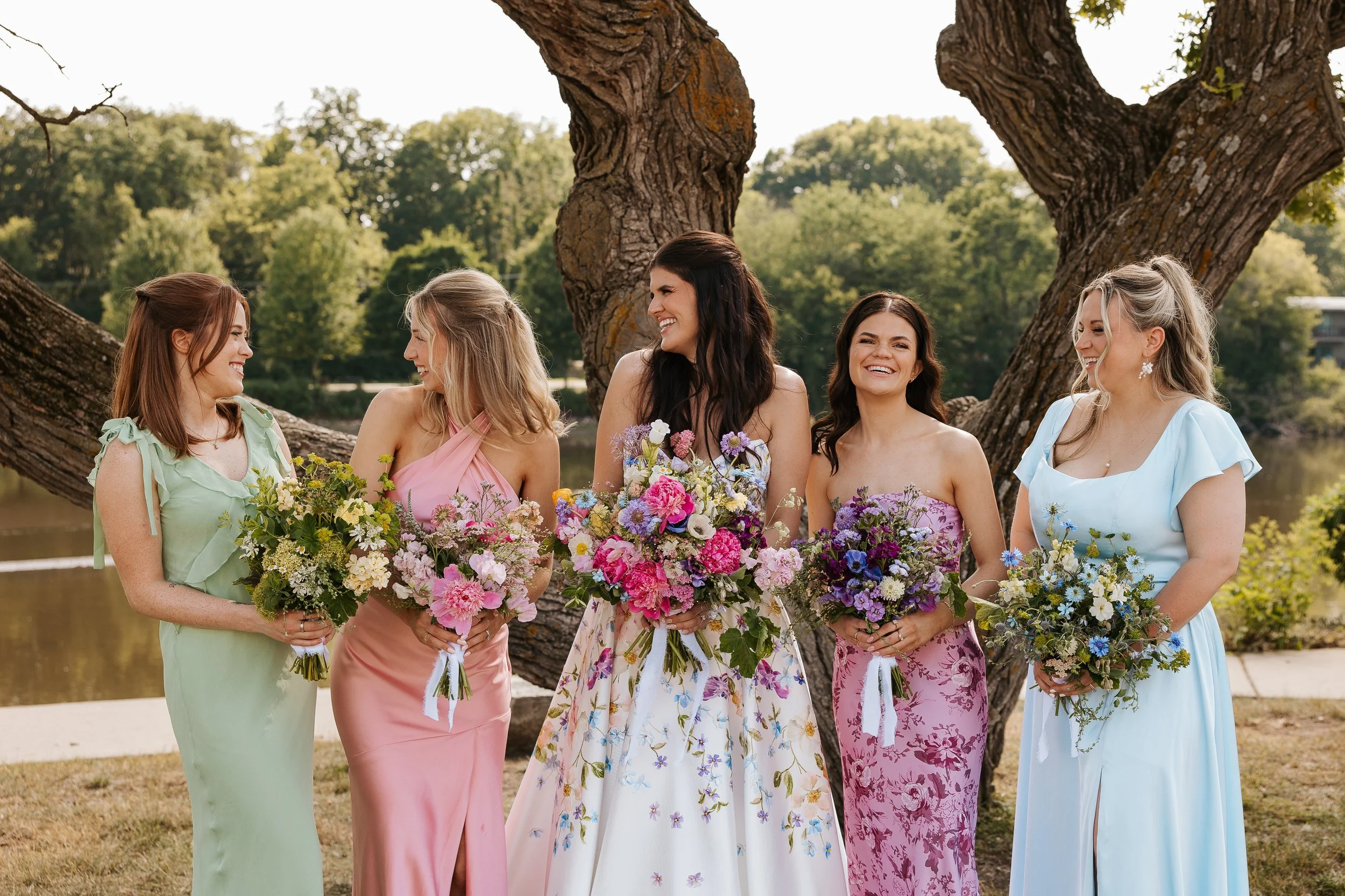 Color coordinated bouquets + dresses!