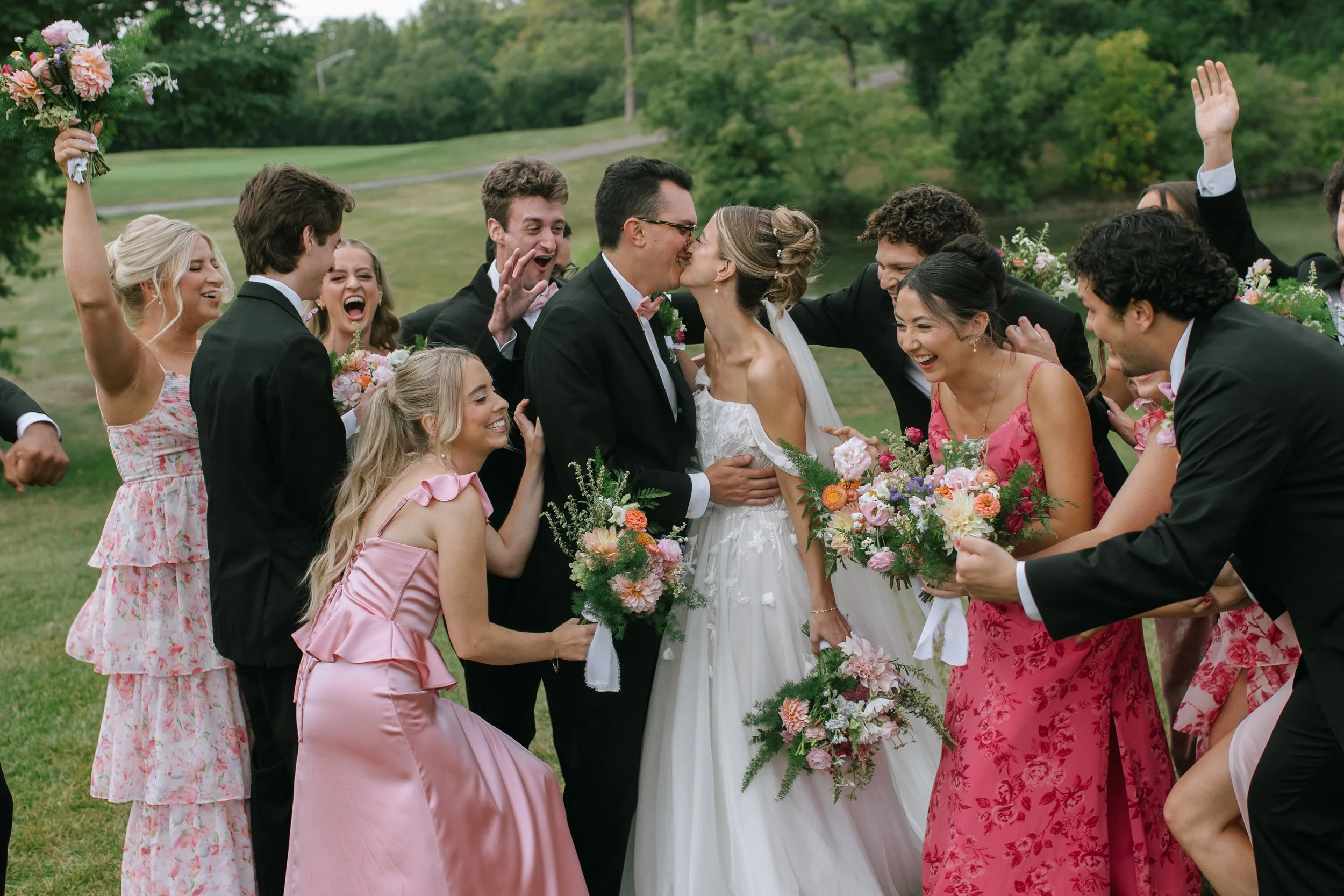 The pink dress + black suits