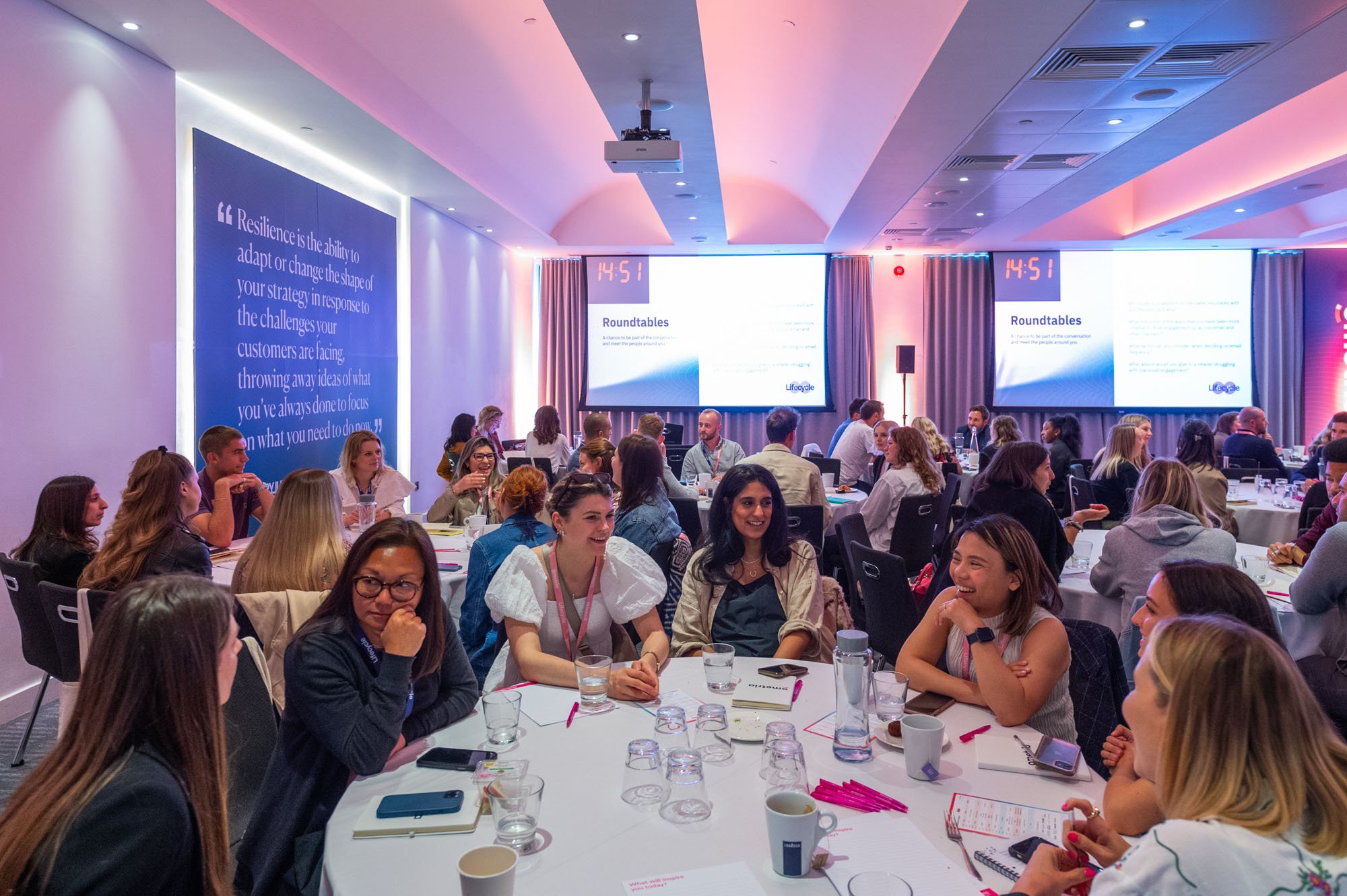  A diverse group of professionals discussing ideas and collaborating in a conference room 