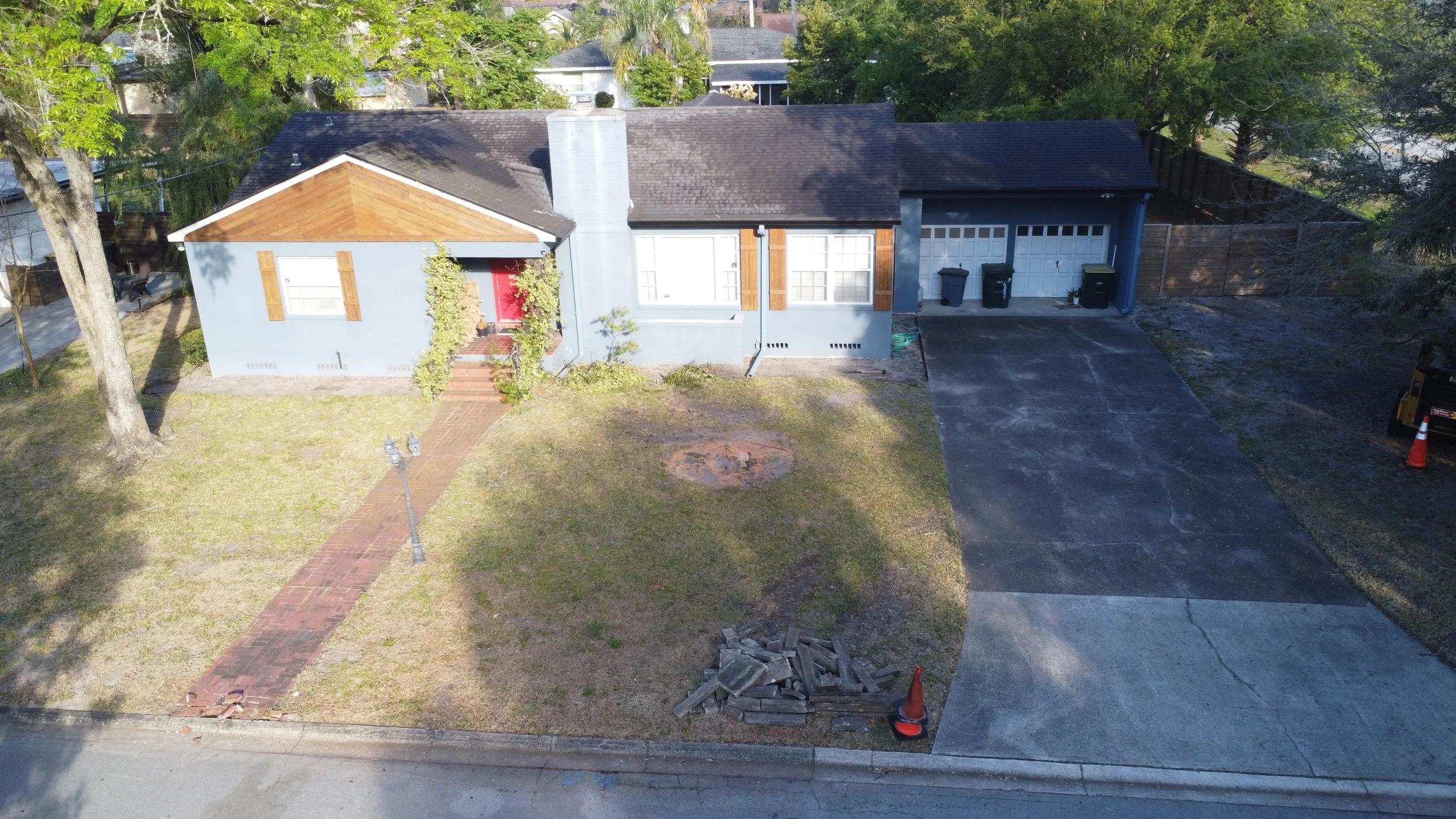 'Before' image of a home with no landscape design.
