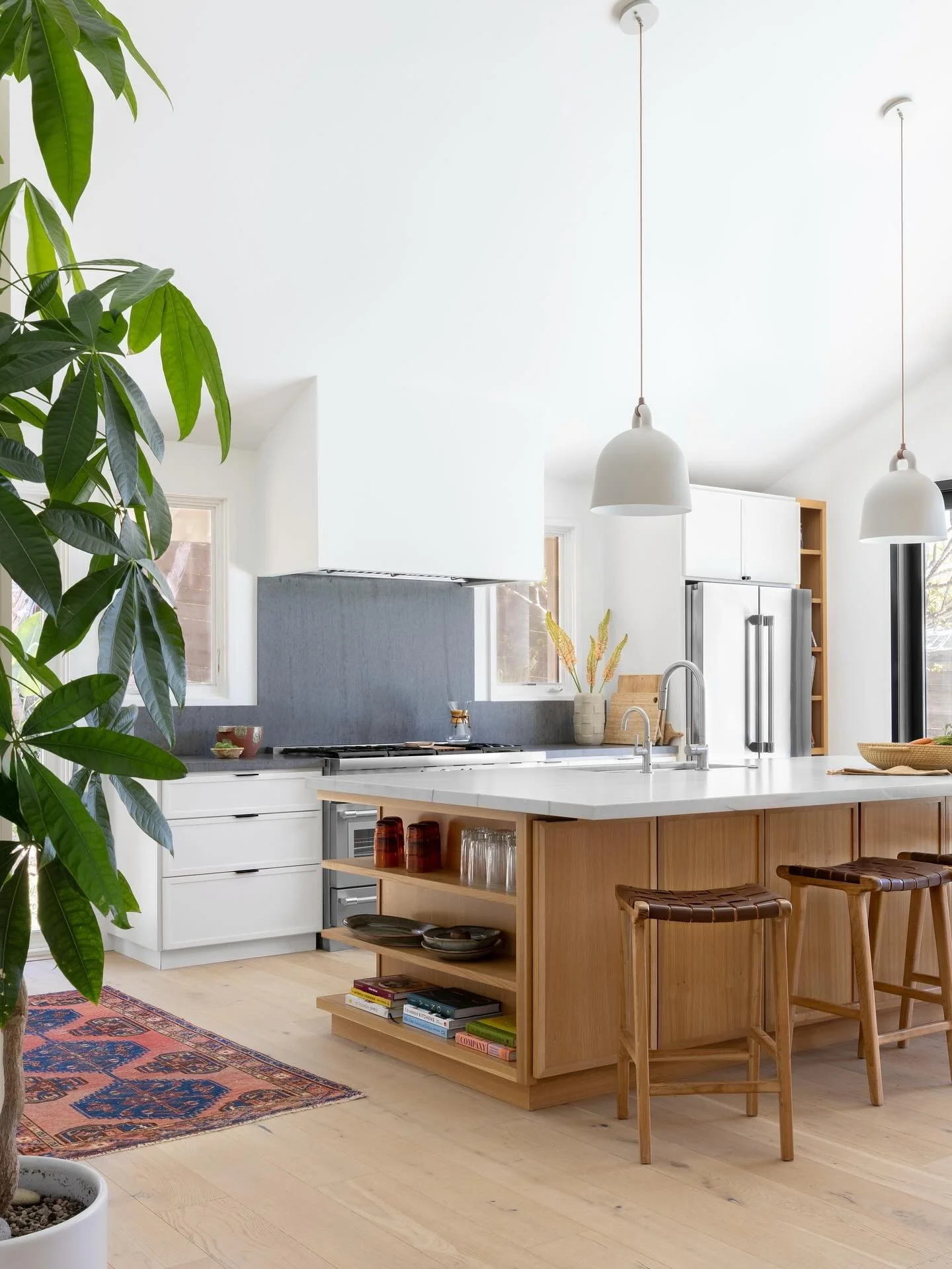 Throwing it back this Friday to my Cabo Way kitchen project. If ever there was a kitchen for entertaining this is it. 

The space features a massive island, built-in bar area, huge sliders for easy flow to the pool, plenty of prep space, storage for 