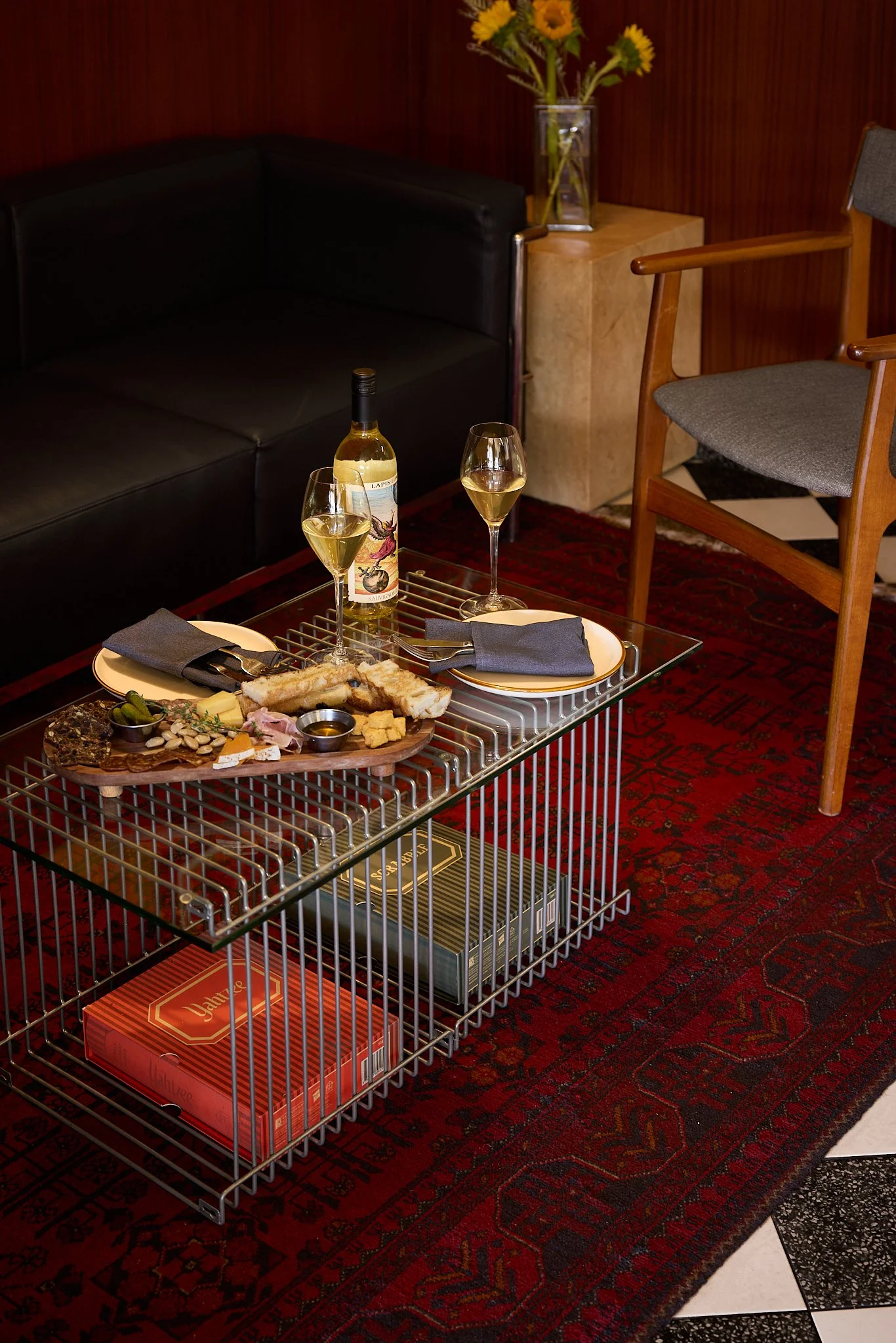 Close-up of mid-century modern hospitality project lounge area, featuring vintage furniture and decor in Encinitas. 