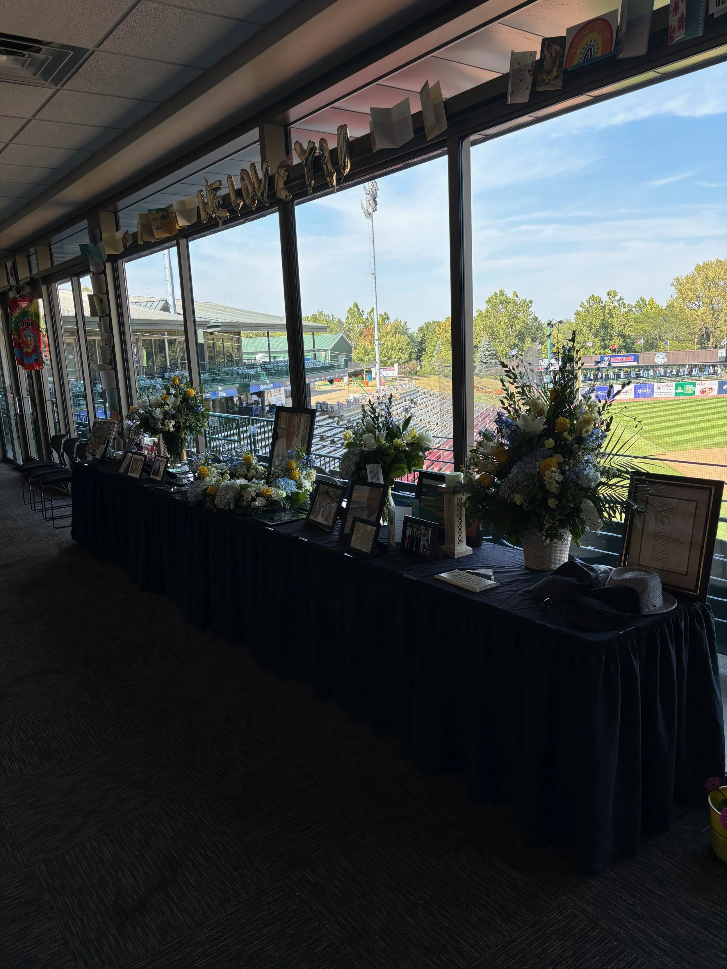 Memorial Service Head Table with flowers.jpg