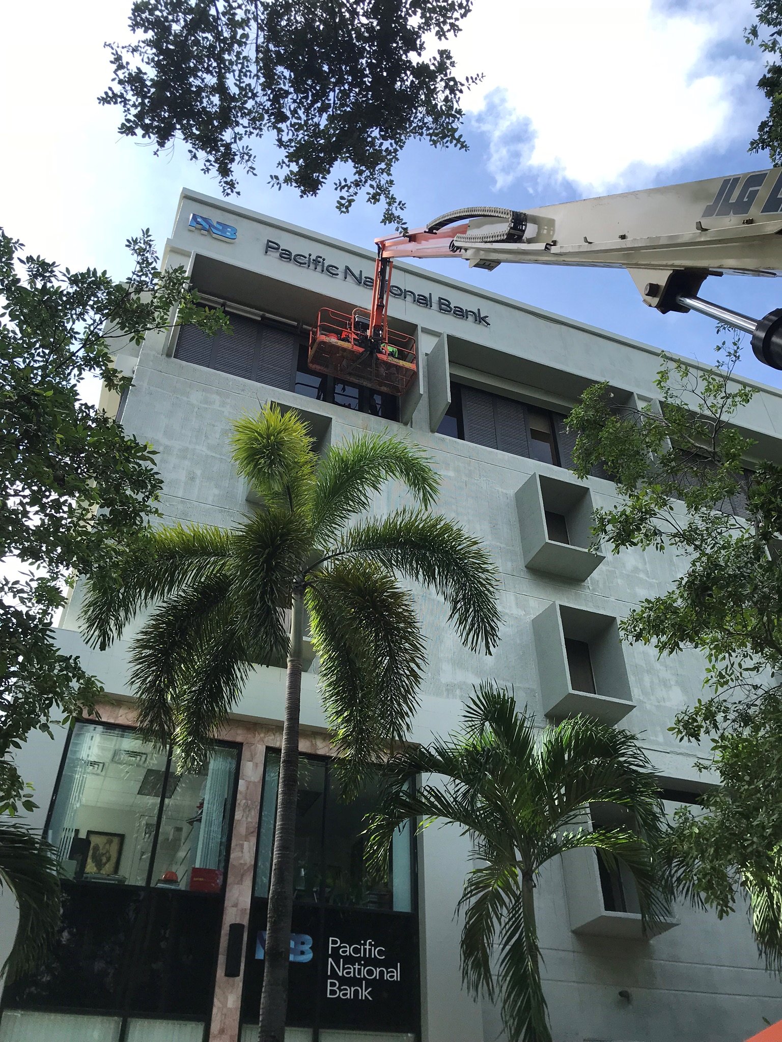 708  Pacific National Bank Brickell Commercial rolldown shutter repair hanging lift.png