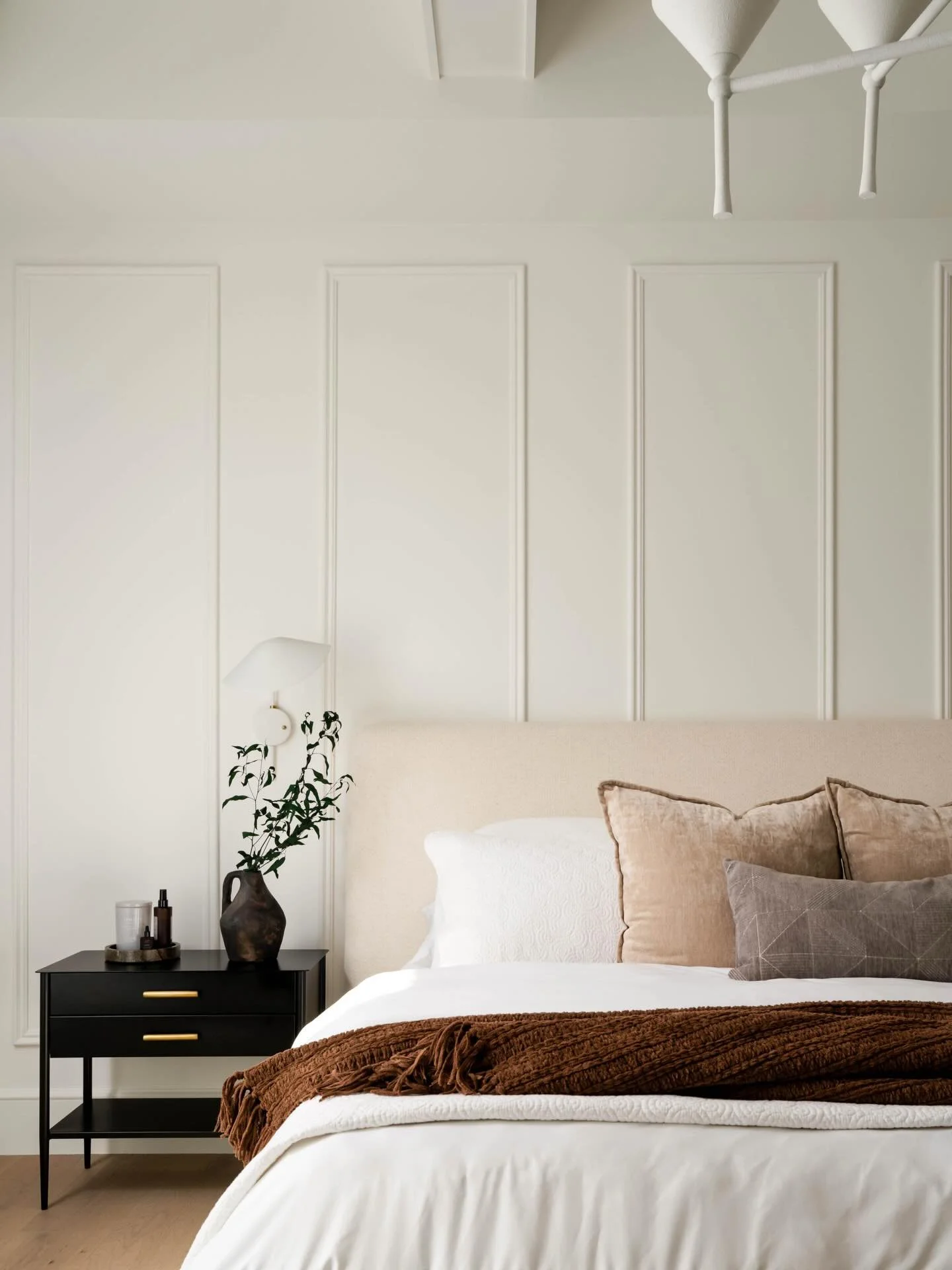 Applied moulding, coffered ceilings, and all the cozy layers. Here until further notice.