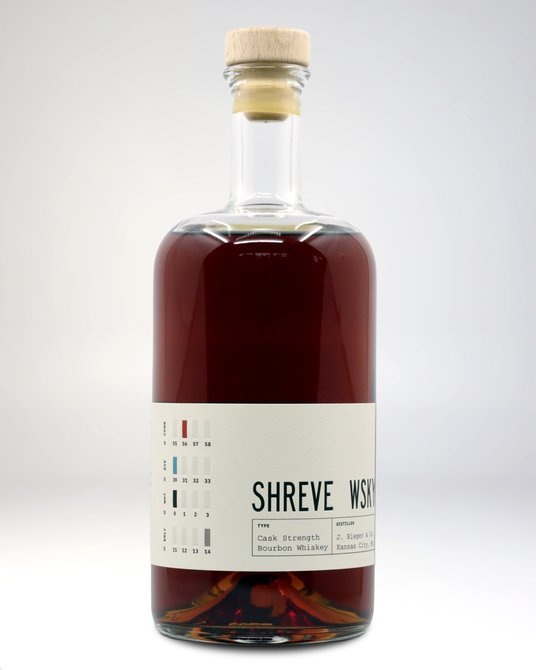 A glass bottle of bourbon whiskey with a label that reads "Shreve WSXY" and details about the type being "Cask Strength Bourbon Whiskey" from Kansas City, Missouri. The bottle has a cork stopper and is filled with dark amber liquid.