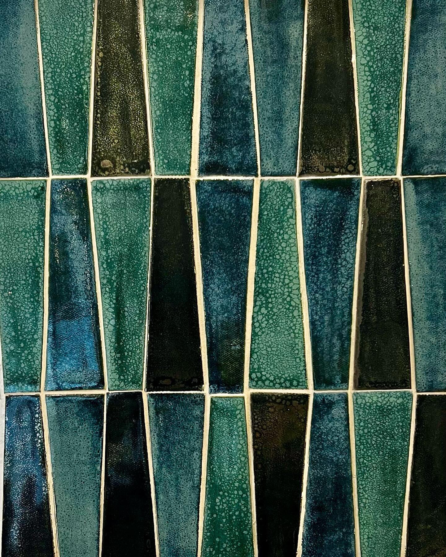 Our trapezoid tiles in a custom mix of green glazes. #trapezoid