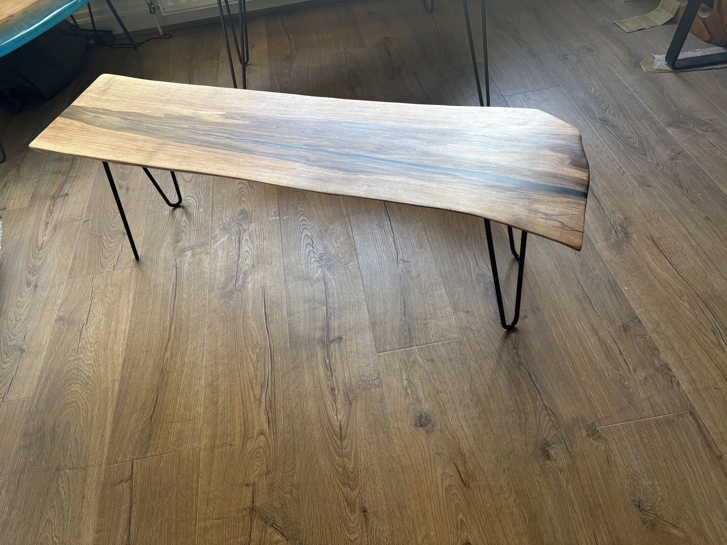 walnut and resin waney edge table