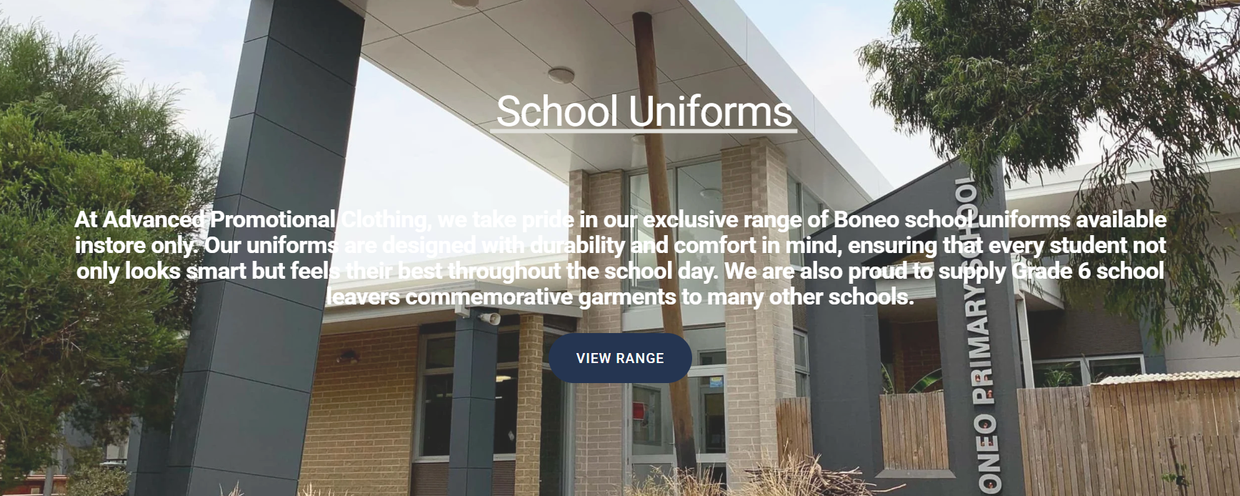 Exterior view of a school building with the sign 'ONE PRIMARY SCHOOL' and an overlay text about school uniforms, featuring trees and a fence in the background.