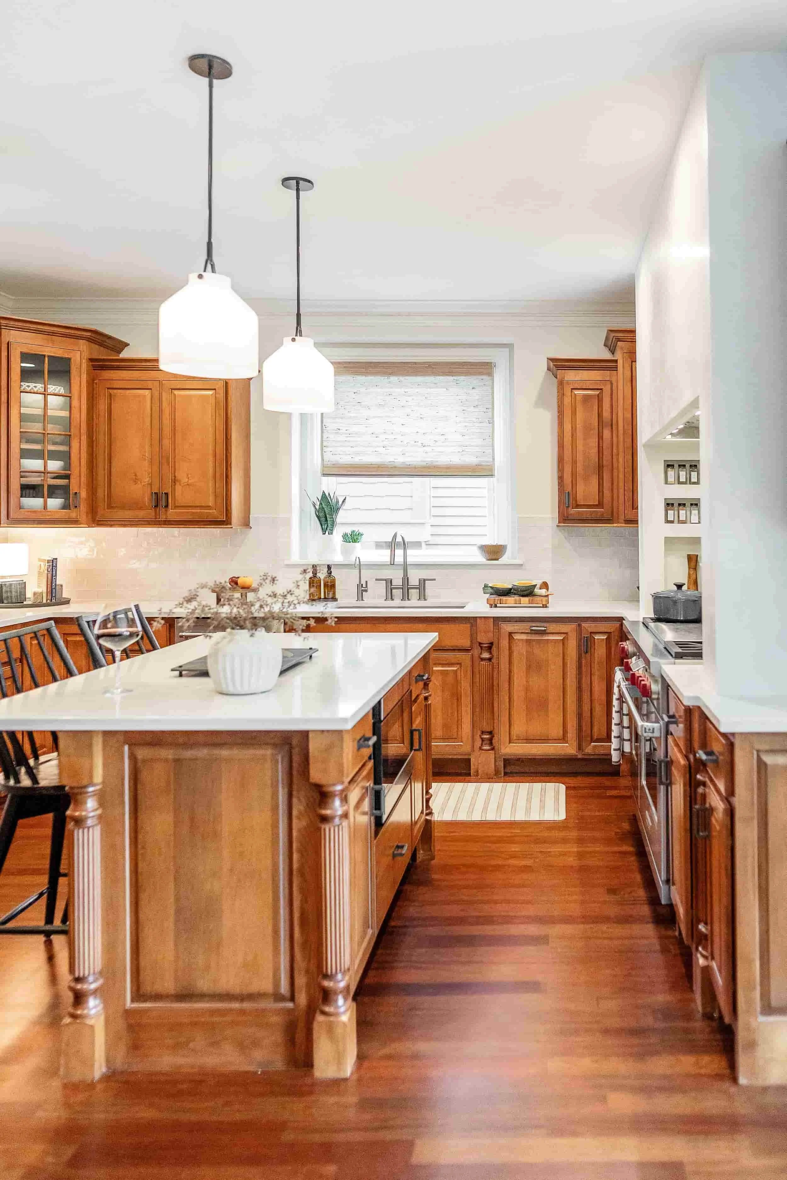 textured backsplash with cherry cabinets
