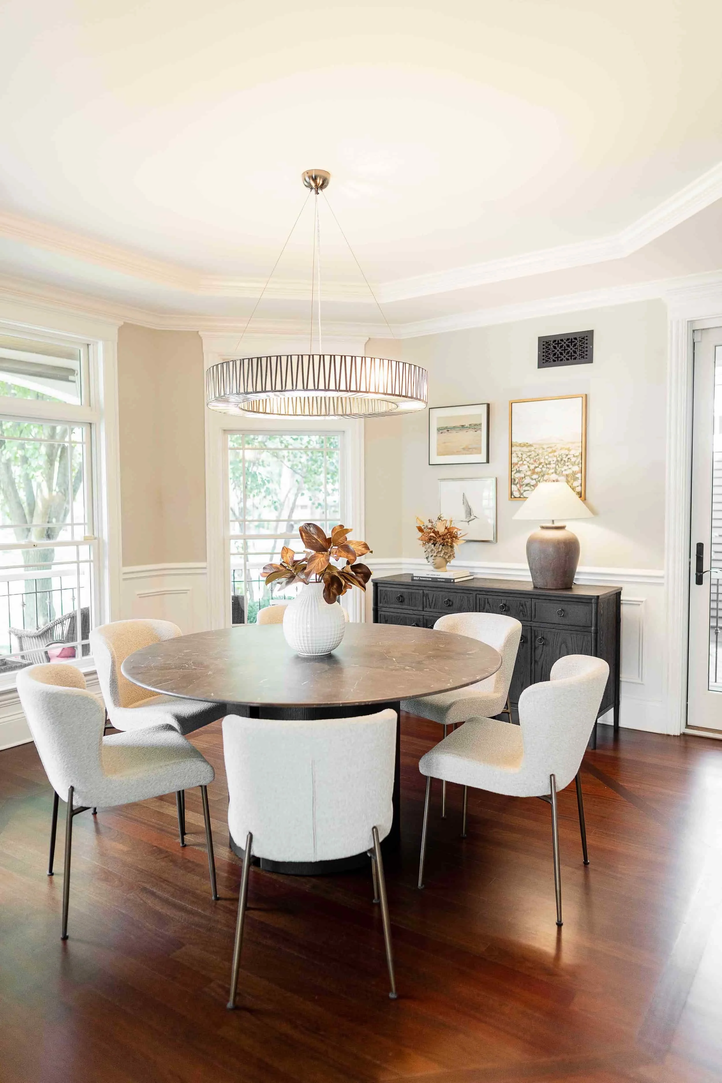 Arhaus chandelier, dining table and chairs