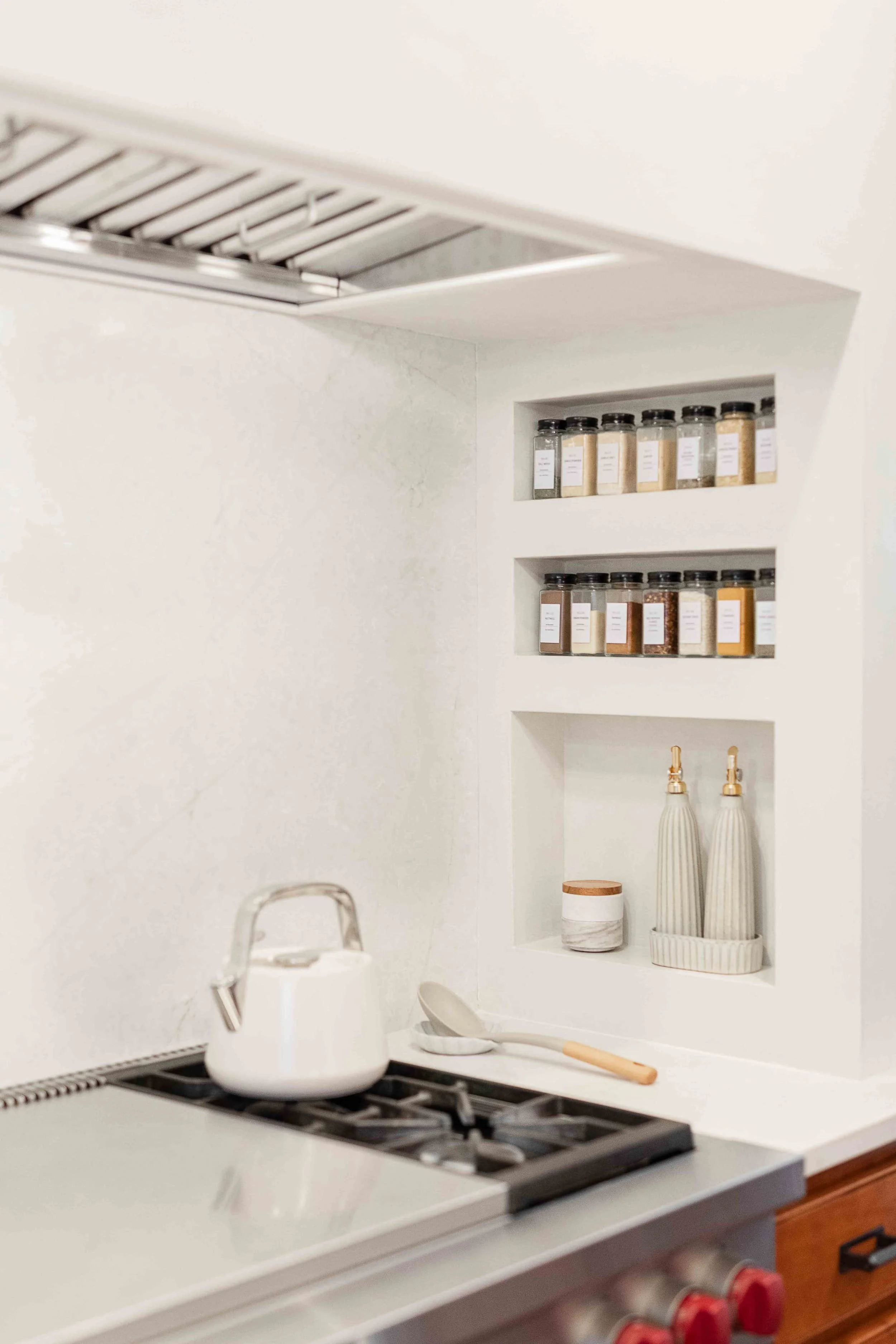 plastered hood with niches for spices