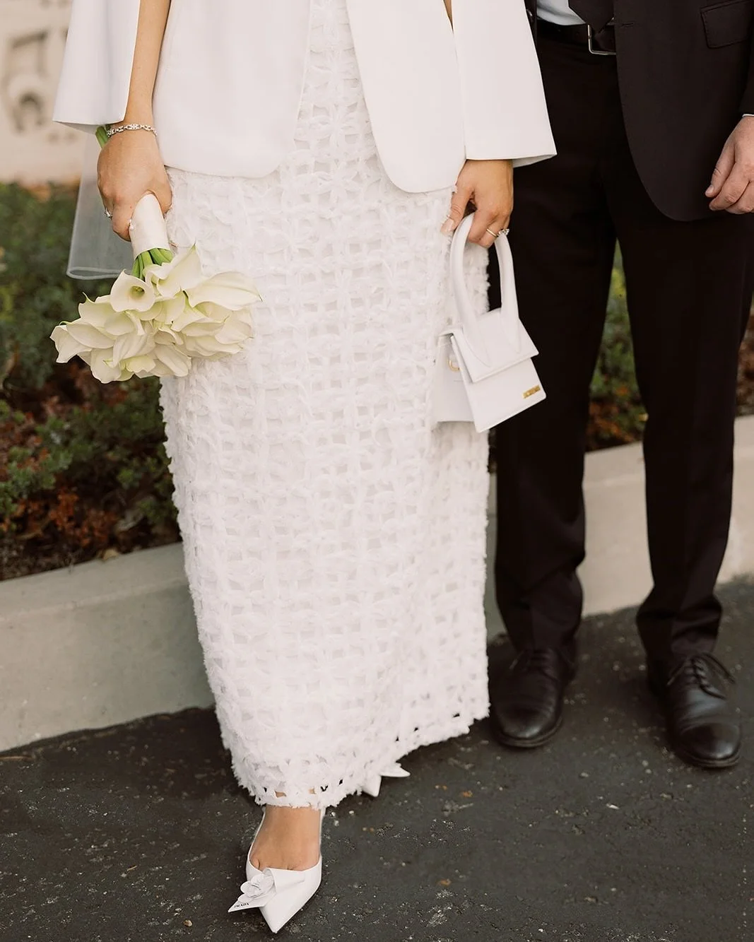 SWS Bride: @xtinarock courthouse fit check ππΌππΌ 
Mixing new and modern fashion pieces to match her Mother’s vintage veil was so fun and special. Her something borrowed, tied in perfectly with the textured @_aje_ set and @prada kitten heels
