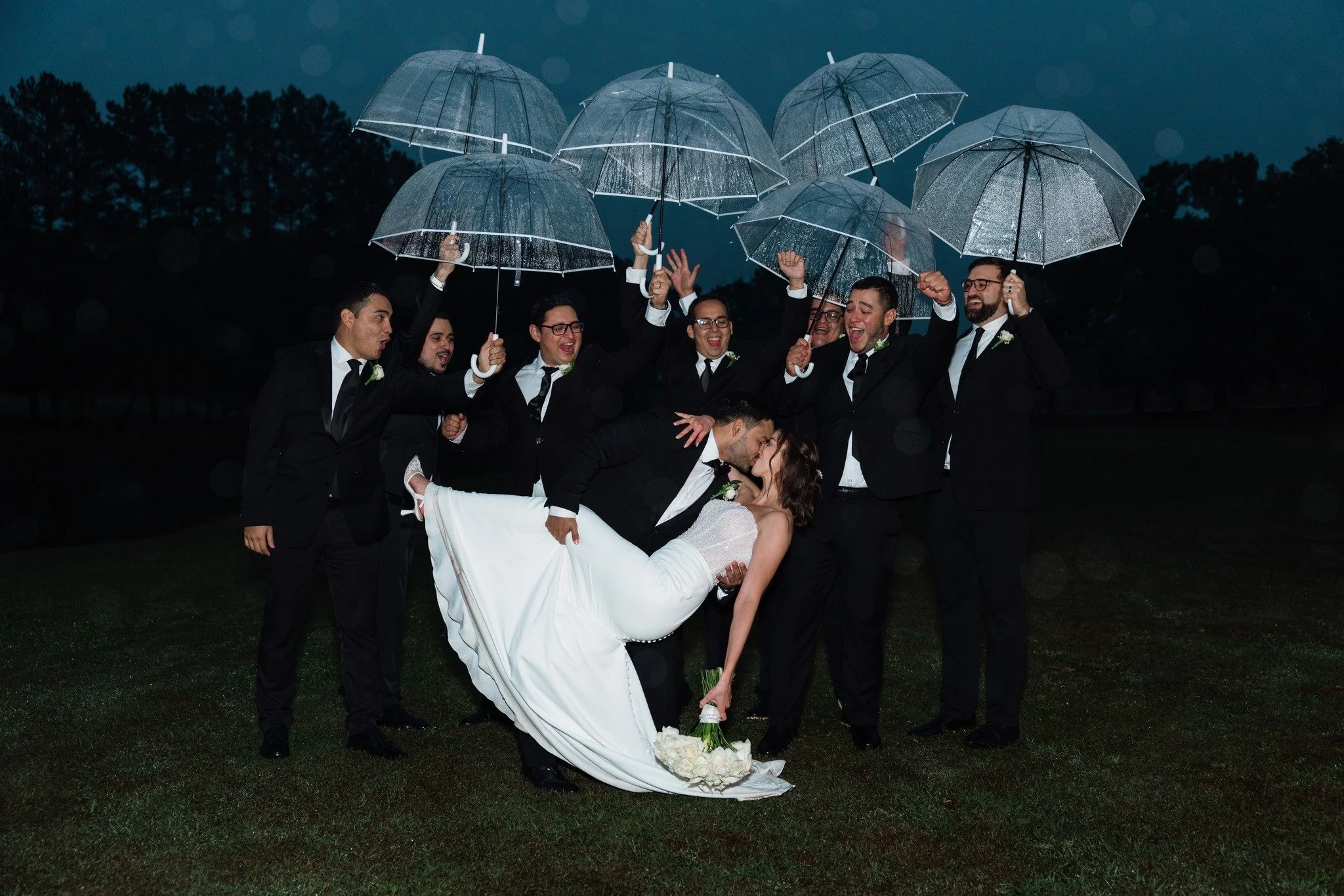 When it rains nonstop on your wedding day, you make the most of it and get that shot in the rain. Mr. &amp; Mrs. del Cid 💕