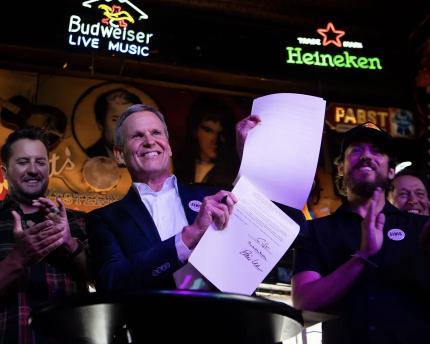 TN Gov. Lee signs ELVIS Act into law in honky-tonk, protects musicians from AI abuses