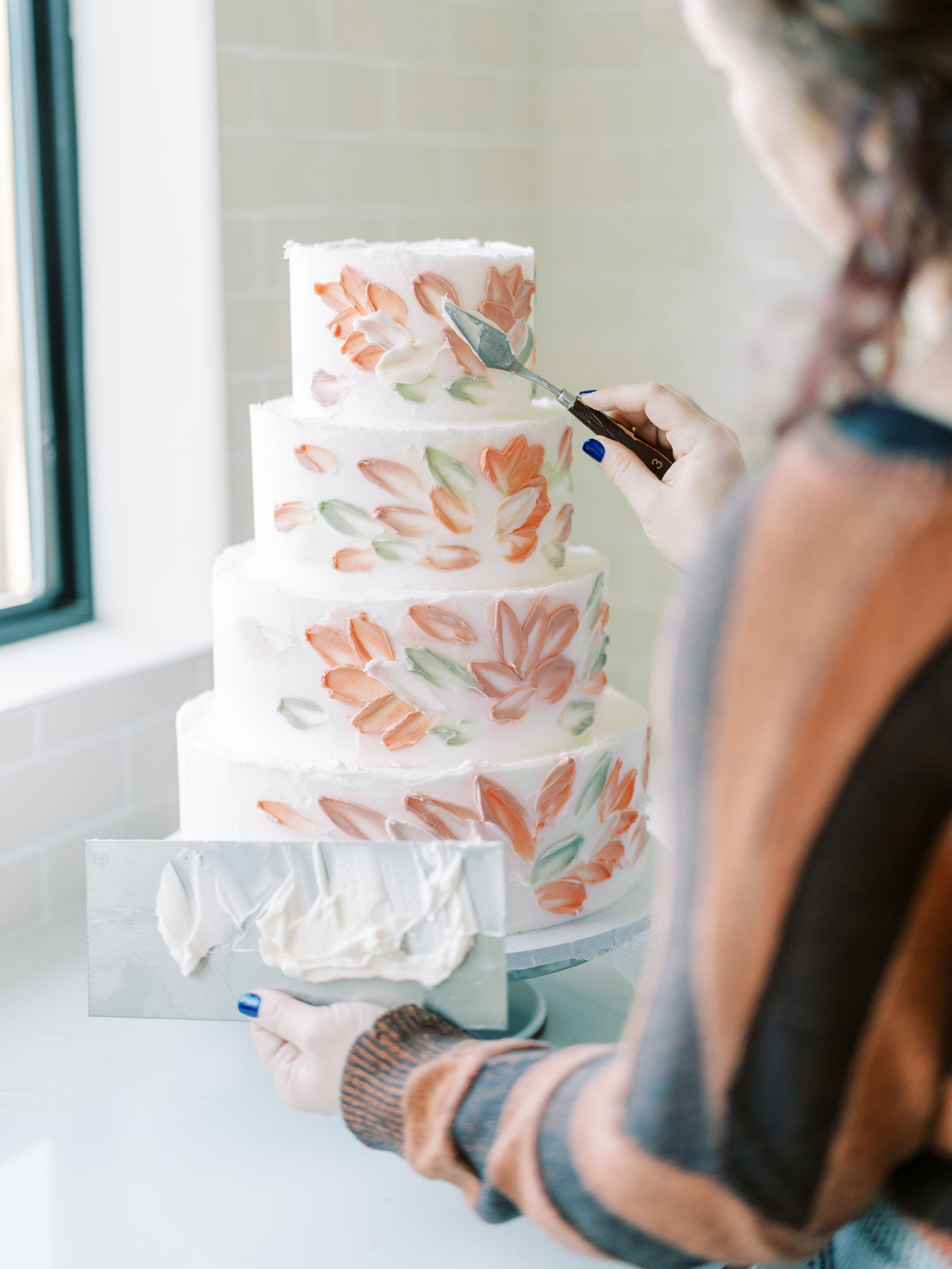 Jessie is action, working on her highly requested floral palette design.