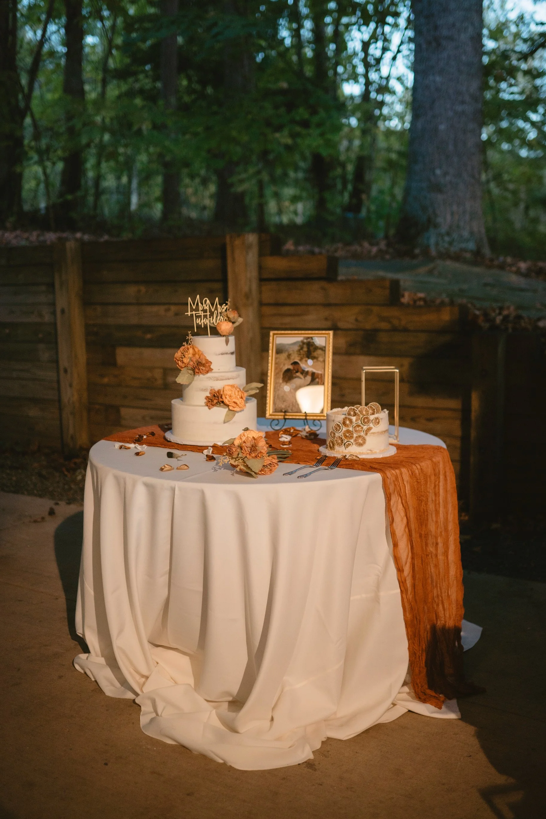 Stunning Naked wedding cake accompanied with a grooms cake!