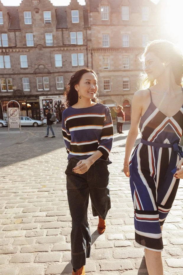 Promod 2018 collection - models wear blue and burgundy striped outfits