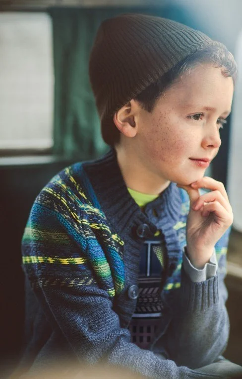 Young Boy wearing woollen jumper and beanie from Tea Collection 2017