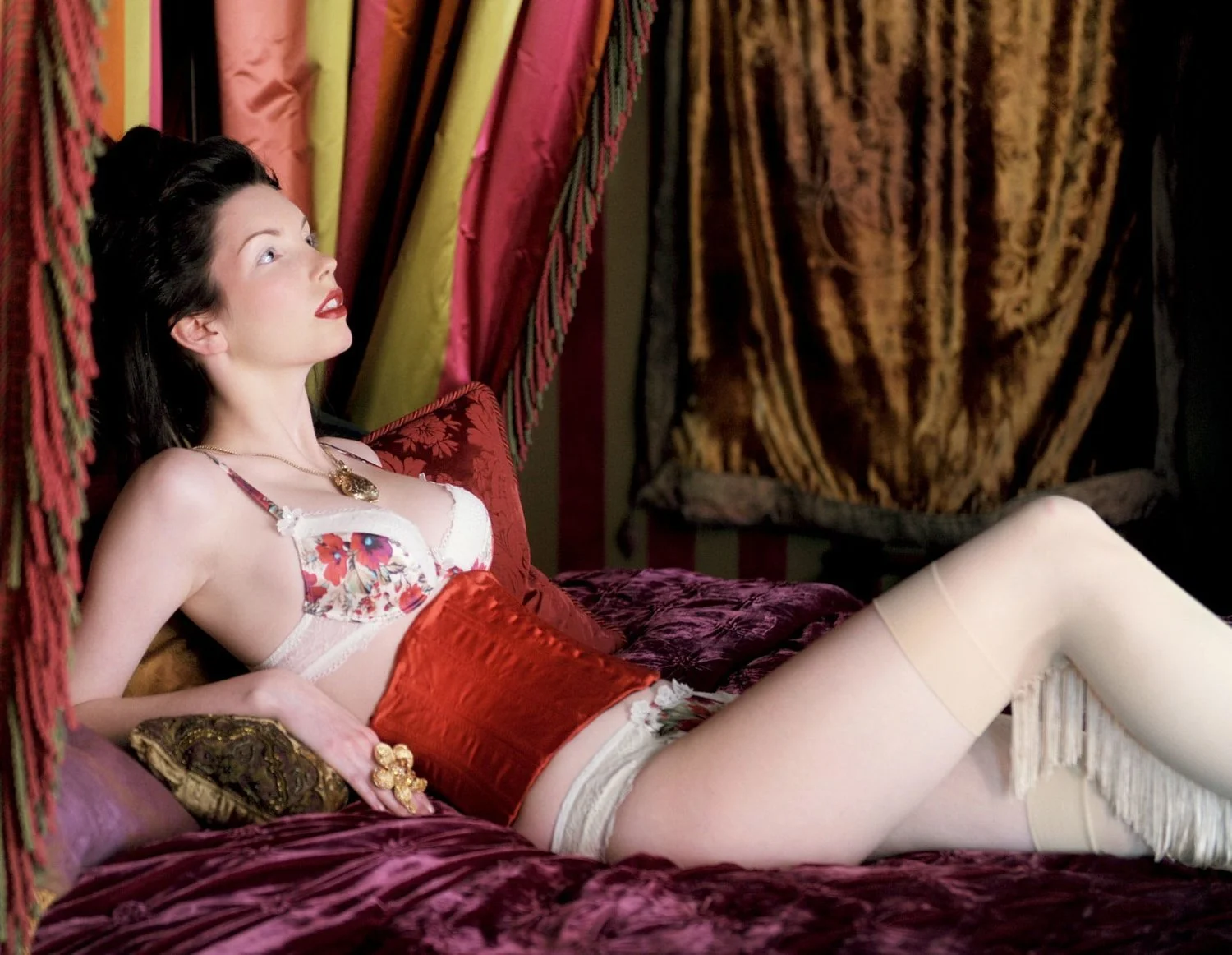 Model wears delicate lingerie with hair and make in the style of Marie-Antoinette