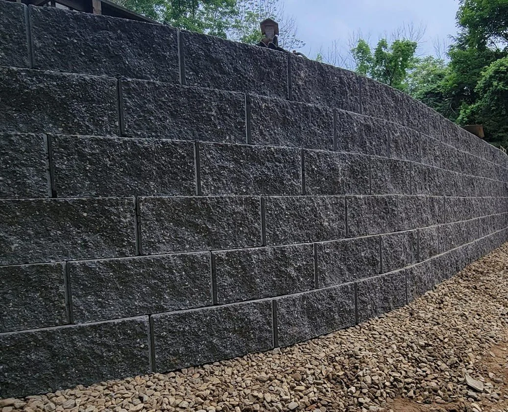 Dark gray block retaining wall