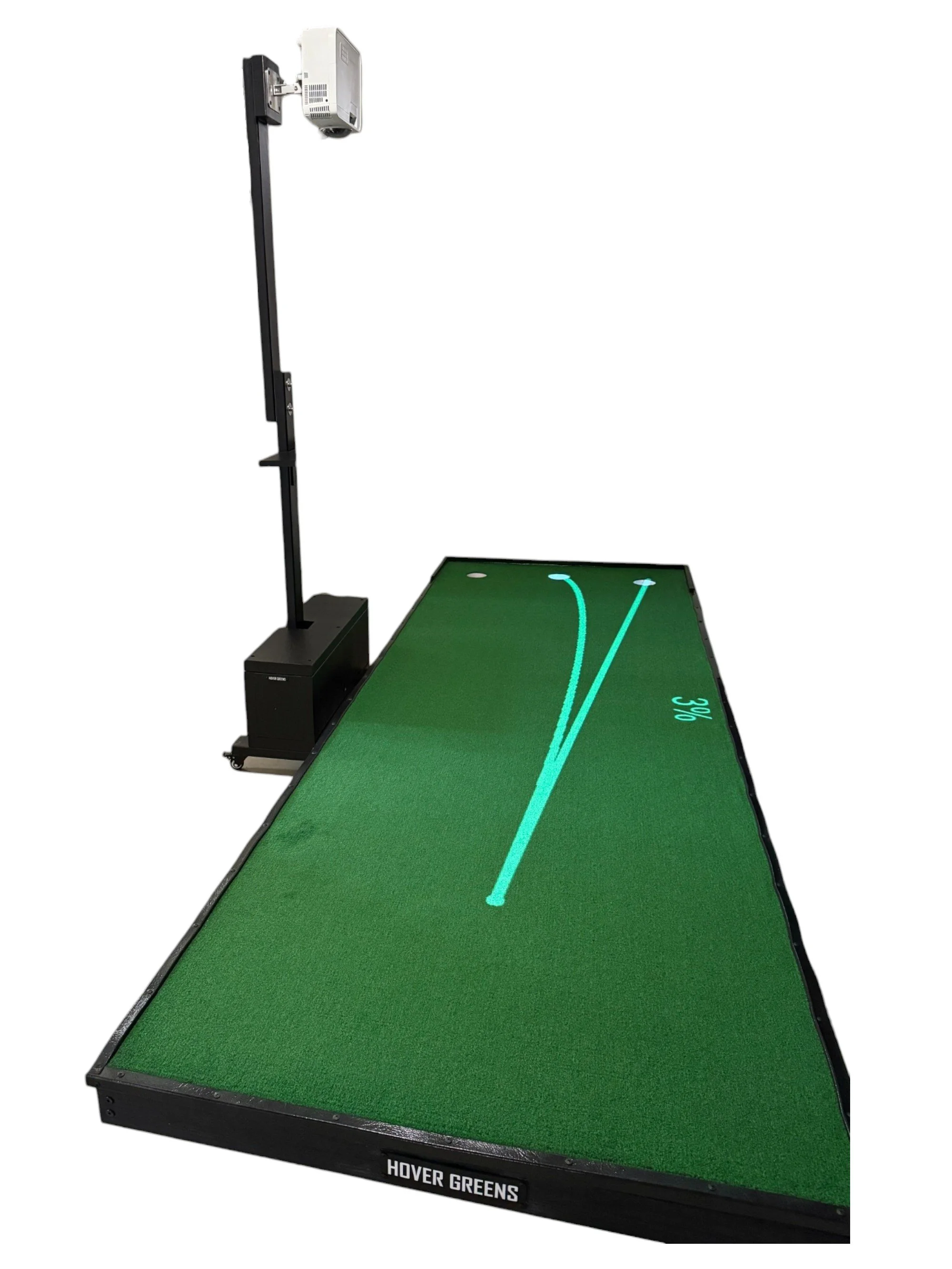 Golf swing analysis simulator with a green mat, digital display showing a 3% slope, and a camera mounted on a tall stand.