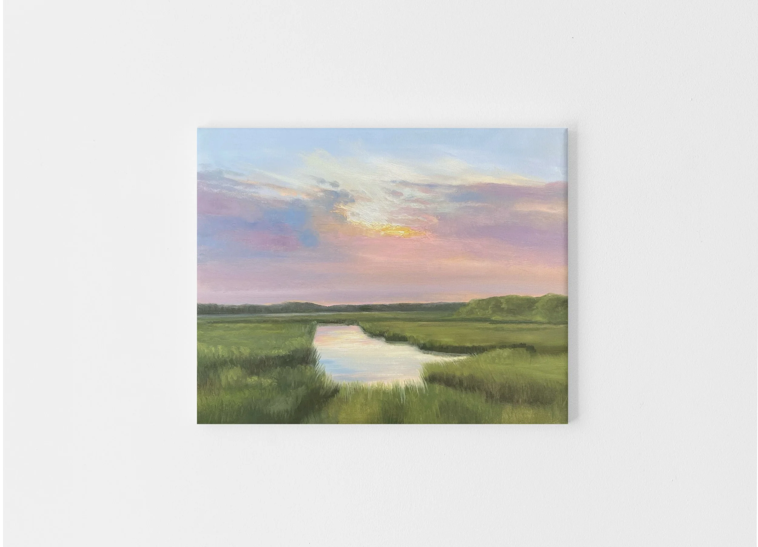 A landscape painting of a sunset over a lake with greenery in the foreground and trees in the background.