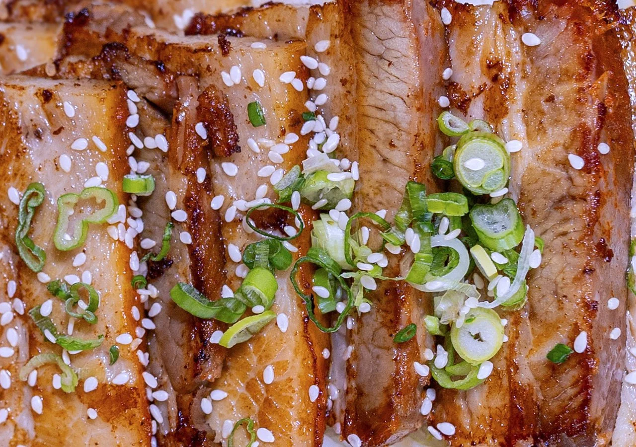 Image of Keoni Pork Belly in full tray for catering menu.