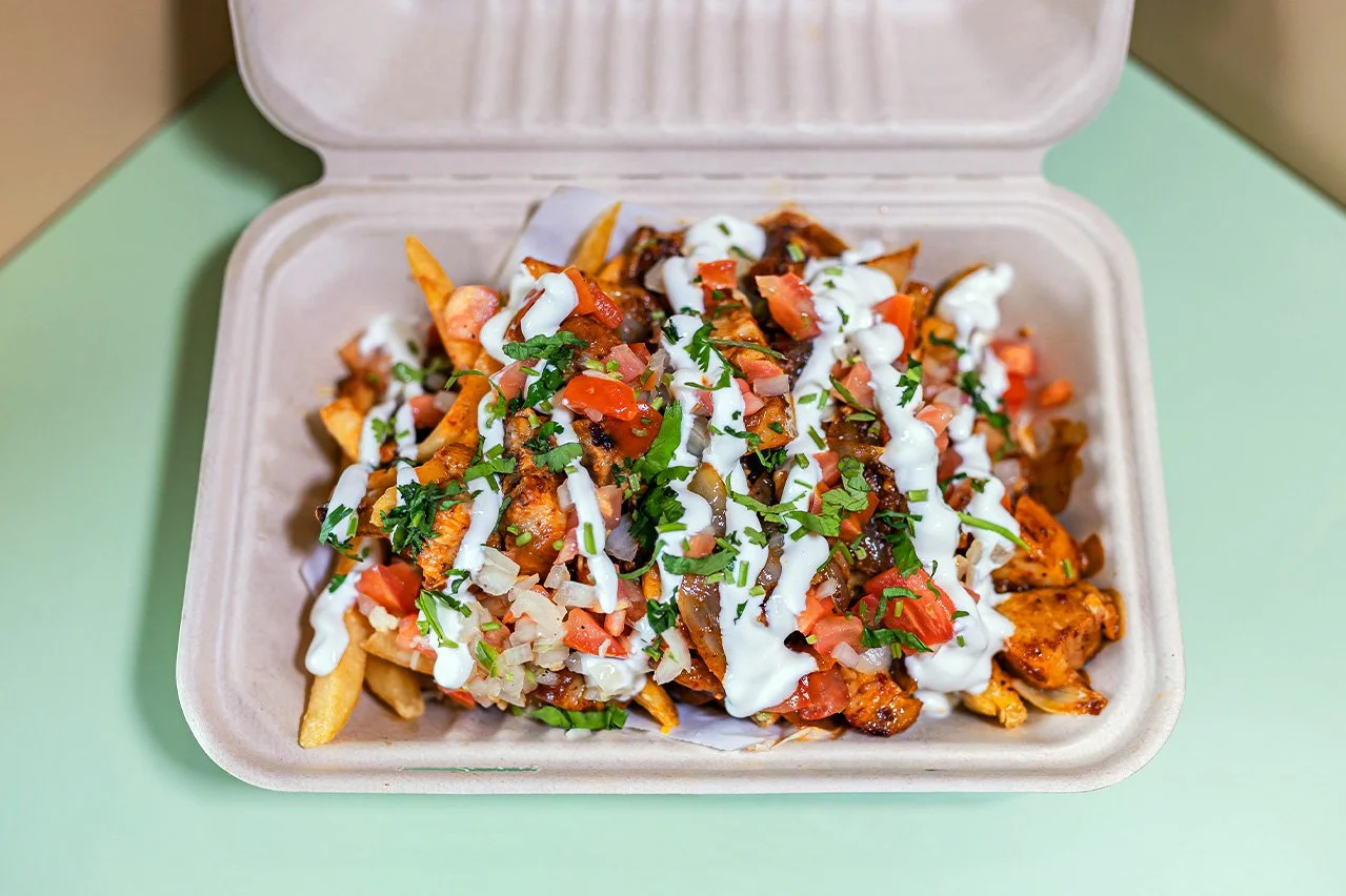 Slow cooked pork belly bits, melted cheese, grilled onions, chipotle salsa, pico de gallo, sour cream, served with fries.