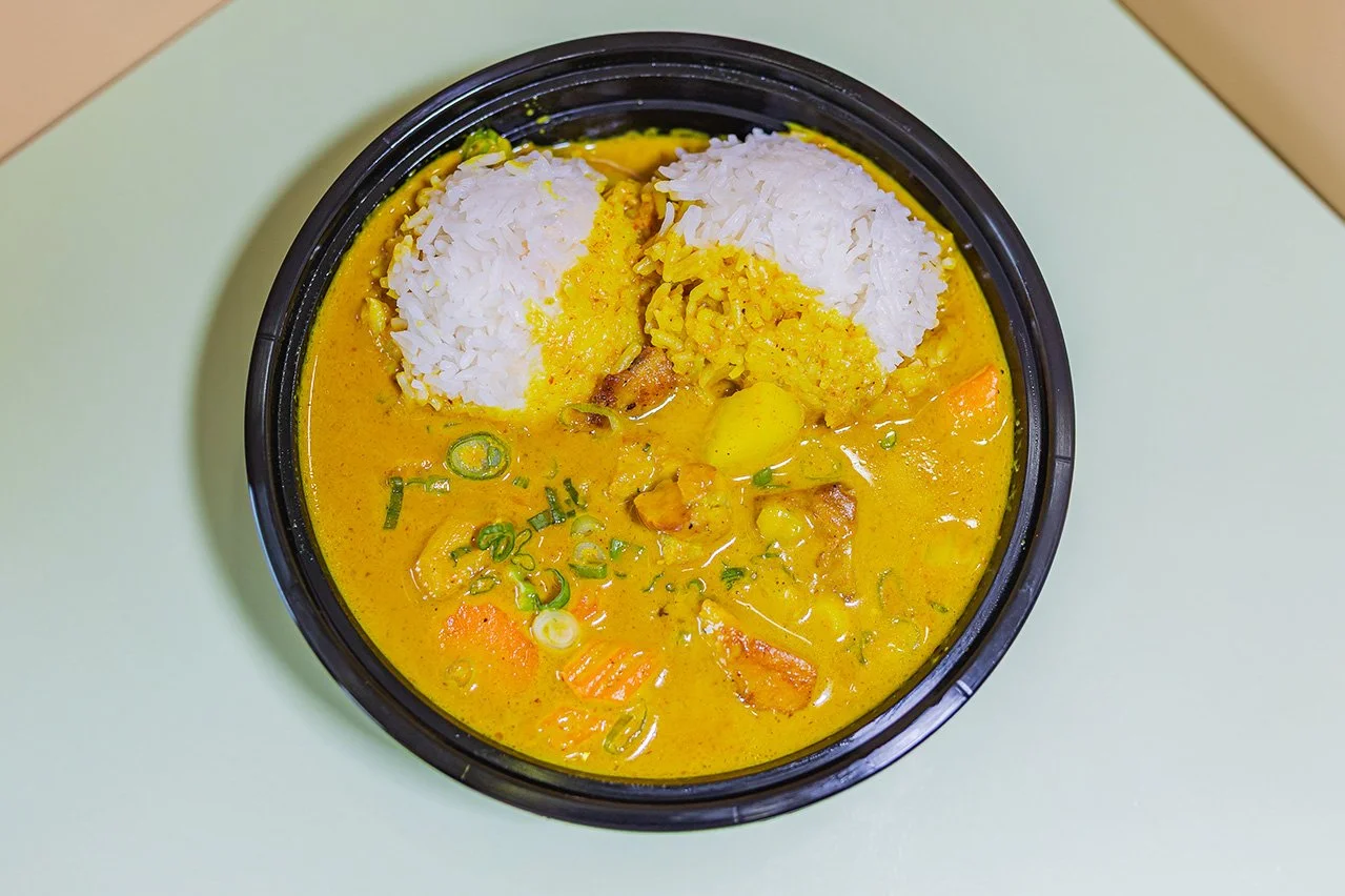 Chicken yellow curry with Chicken, potato, carrot, onion, coconut milk, yellow curry, served with white rice.