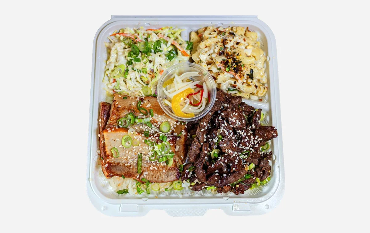 Hawaiian style Pork belly and beef combination plate with macaroni salad and house slaw over rice
