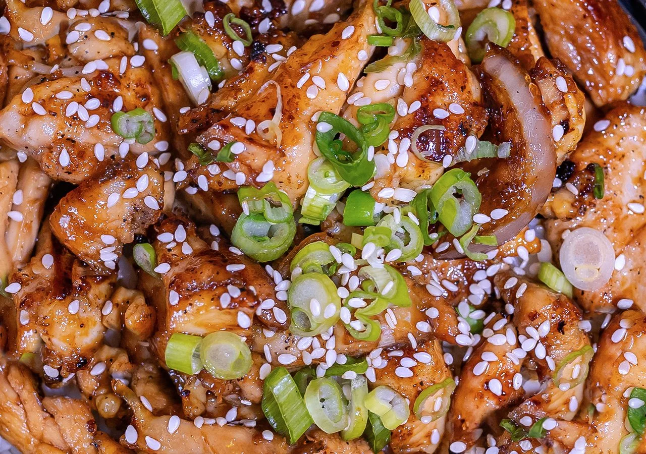 Image of teriyaki chicken in full tray for catering menu.