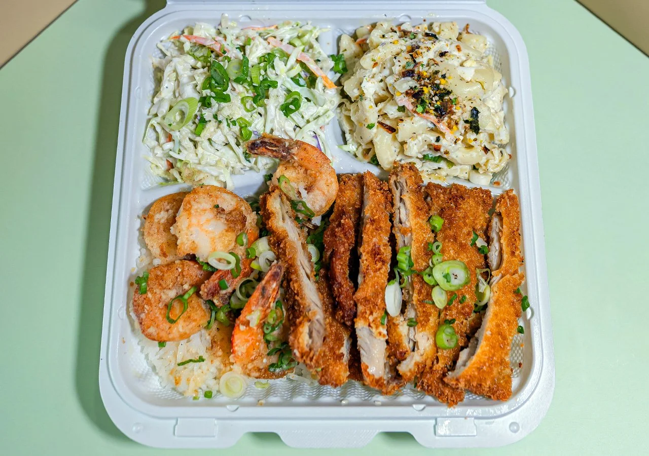 Chicken of any type plus Garlic Butter Shrimp plate over rice with side of house slaw and macaroni salad.